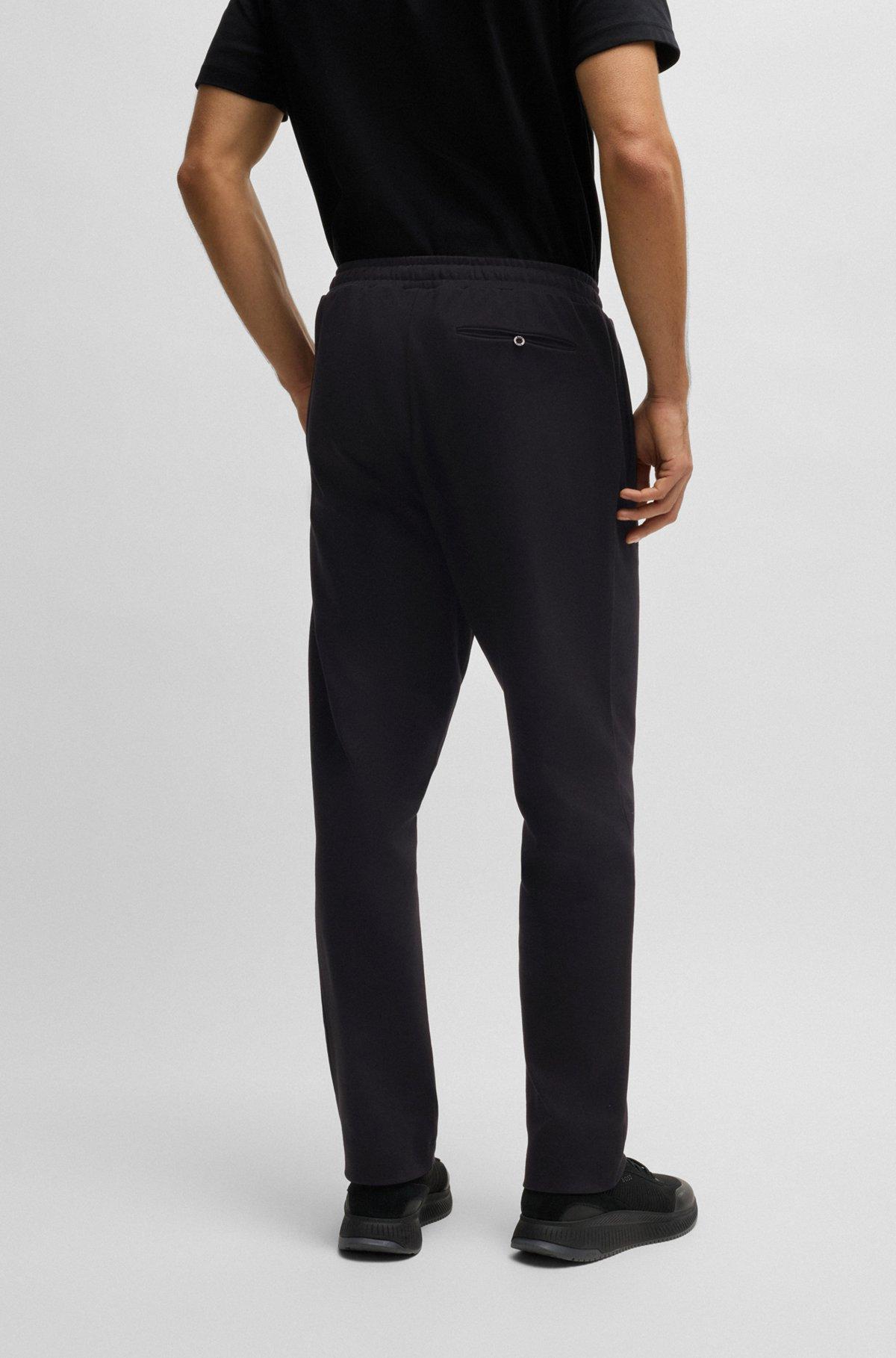 BOSS - Cotton tracksuit bottoms with Double B monogram - Black Product Image