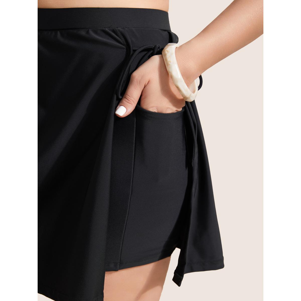 Plus Size High Rise Tie Knot Side Pocket Swim Bottom Women's Swimwear Black Beach Tie knot High stretch Bodycon High Rise Slanted pocket Curve Swim Bottoms BloomChic 26/4X Product Image