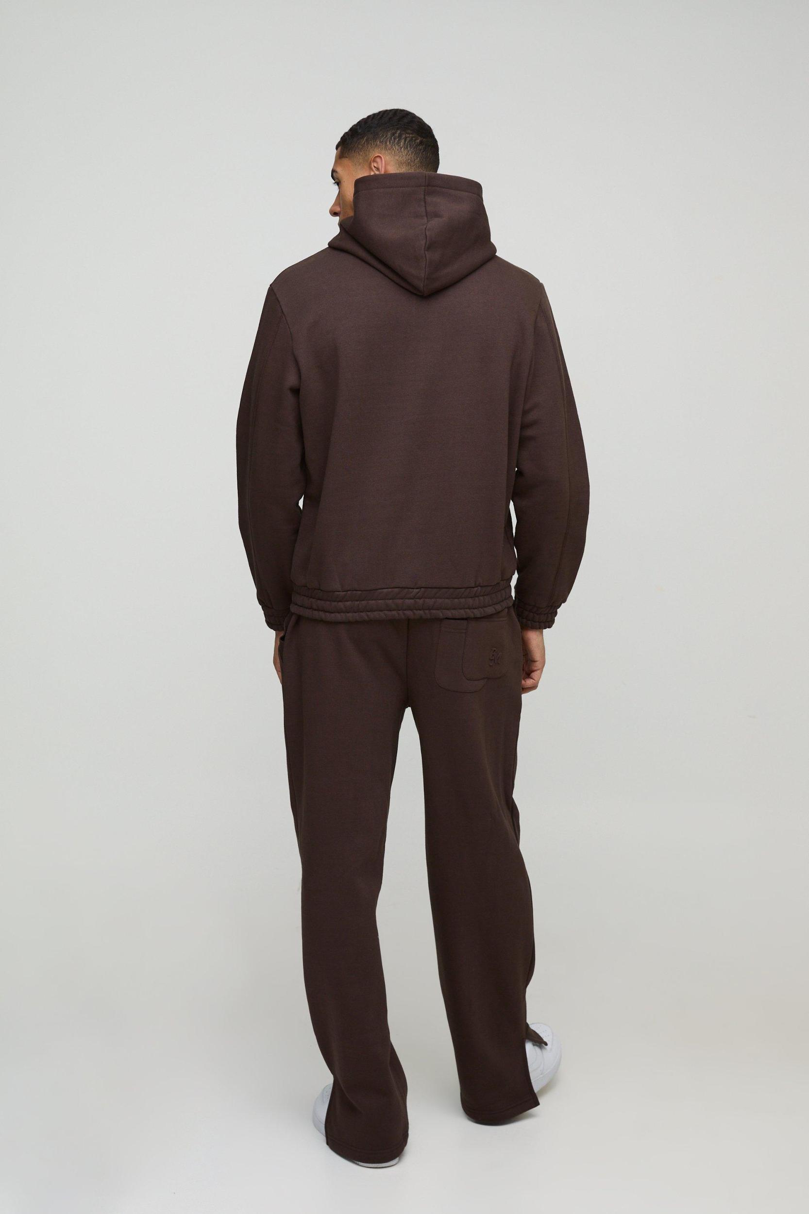 Relaxed Heavyweight Embossed Pocket Detail Split Hem Sweatpants | boohooMAN USA Product Image