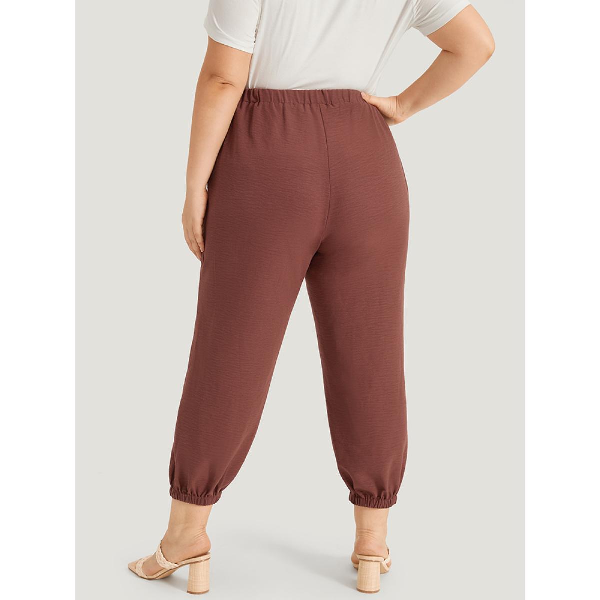 Plus Size Solid Patched Pocket Bowknot Button Detail Pants Women Rust Casual High Rise Dailywear Pants BloomChic 10/M Product Image