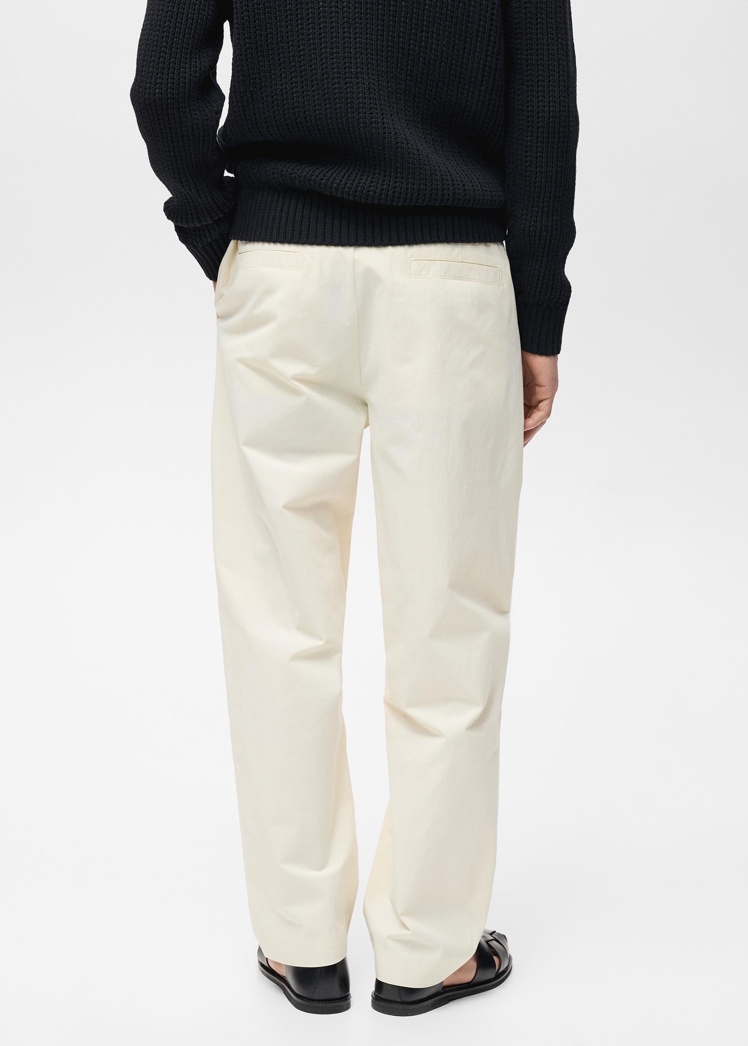 Relaxed-fit pants with belt - Men | MANGO USA Product Image