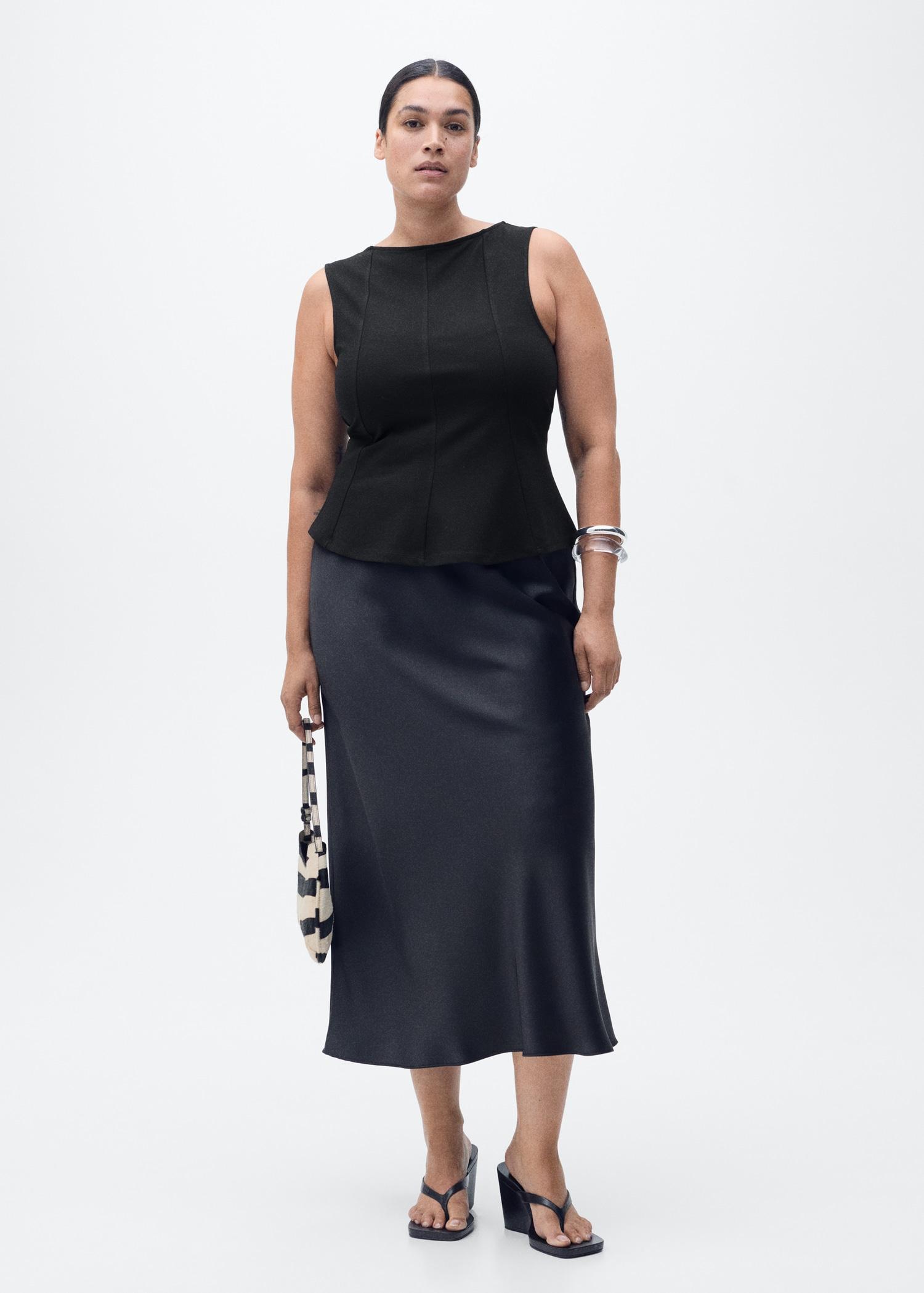 Peplum top with seam detail - Women | MANGO USA Product Image