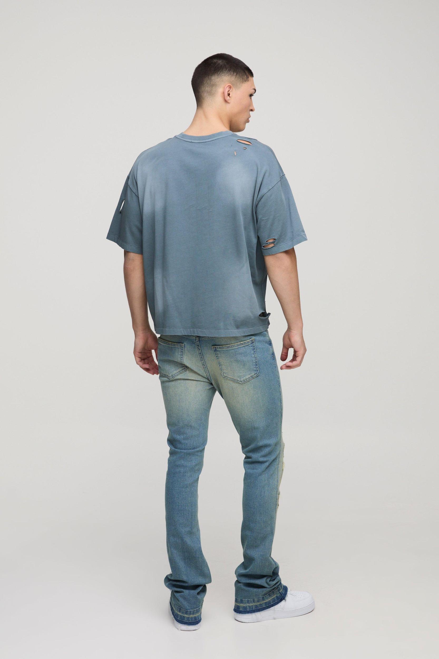 Skinny Stretch Stacked Flared Ripped Jeans | boohooMAN USA Product Image