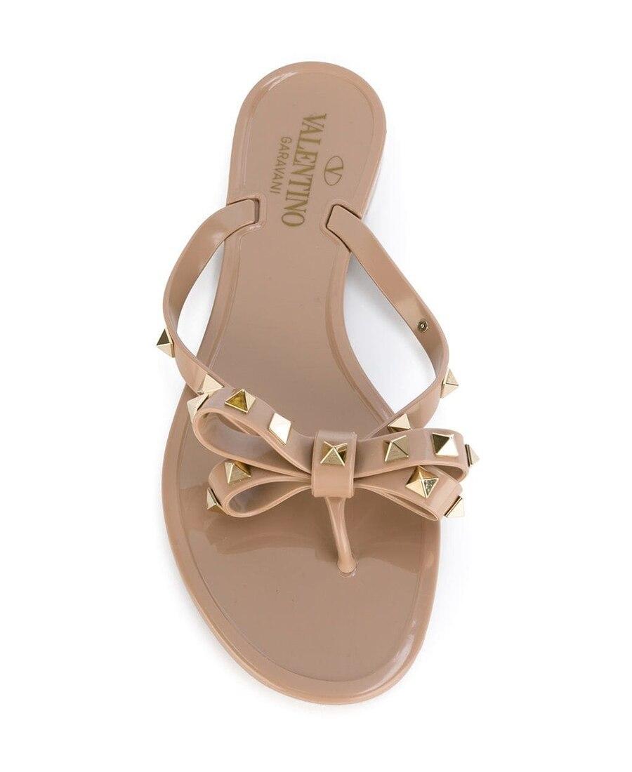 VALENTINO GARAVANI Women Rockstud Rubber Flip Flops In Beige Product Image