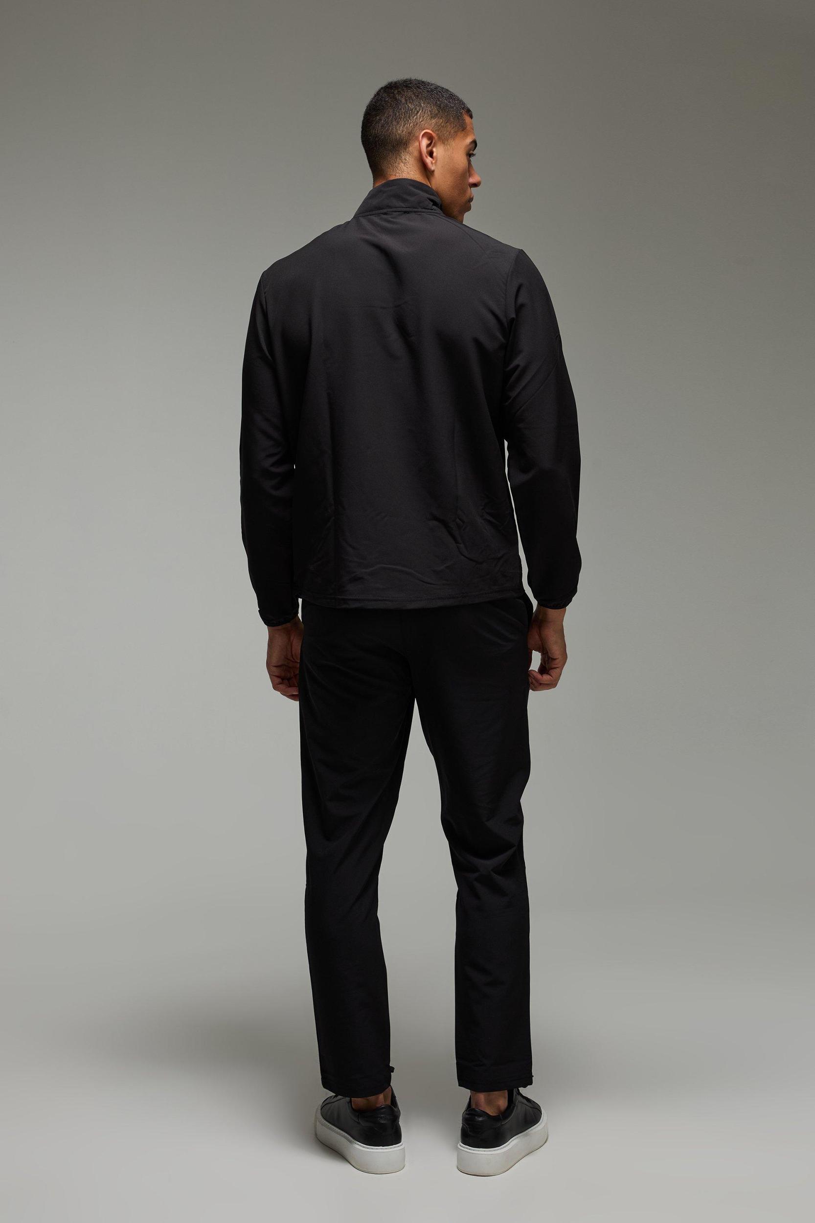 Man Active Regular Fit Golf 1/4 Zip Windbreaker | boohooMAN USA Product Image