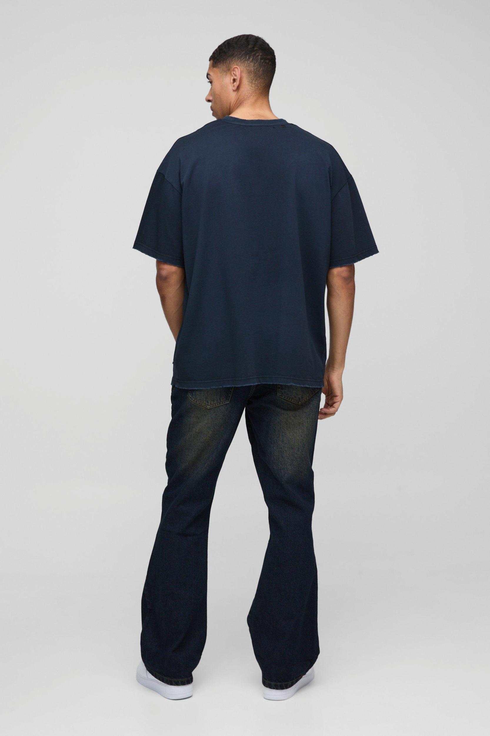 Relaxed Rigid Flare Washed Panelled Denim Jeans | boohooMAN USA Product Image