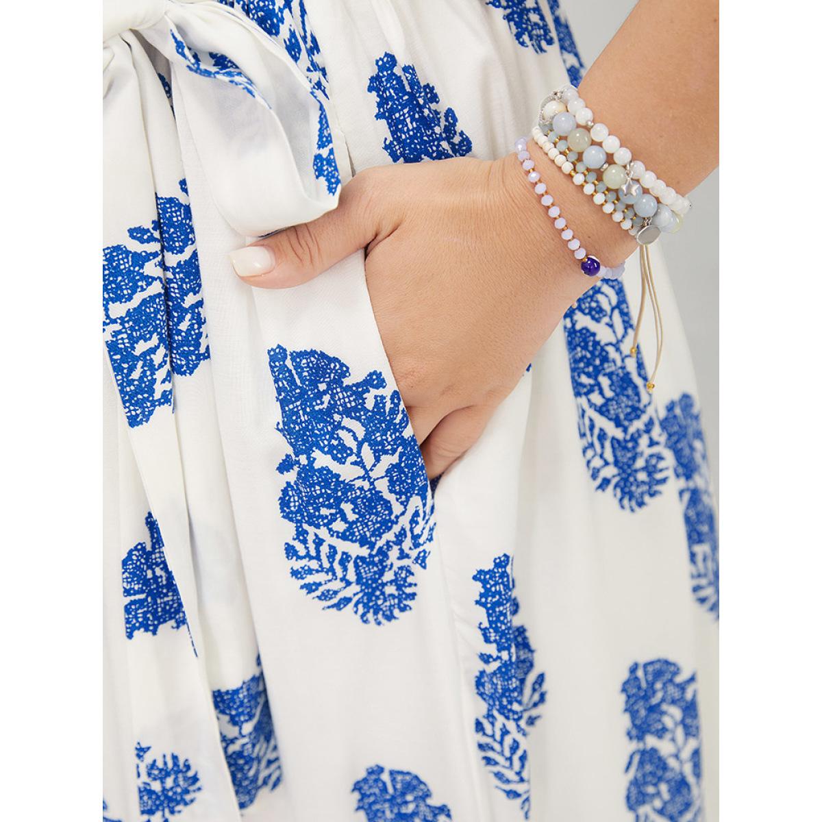 Plus Size Floral Print Pocket Belted Ruffle Hem Knee Dress Blue Women Vacation Printed V-neck Short sleeve Curvy Knee Dress BloomChic 22-24/3X Product Image