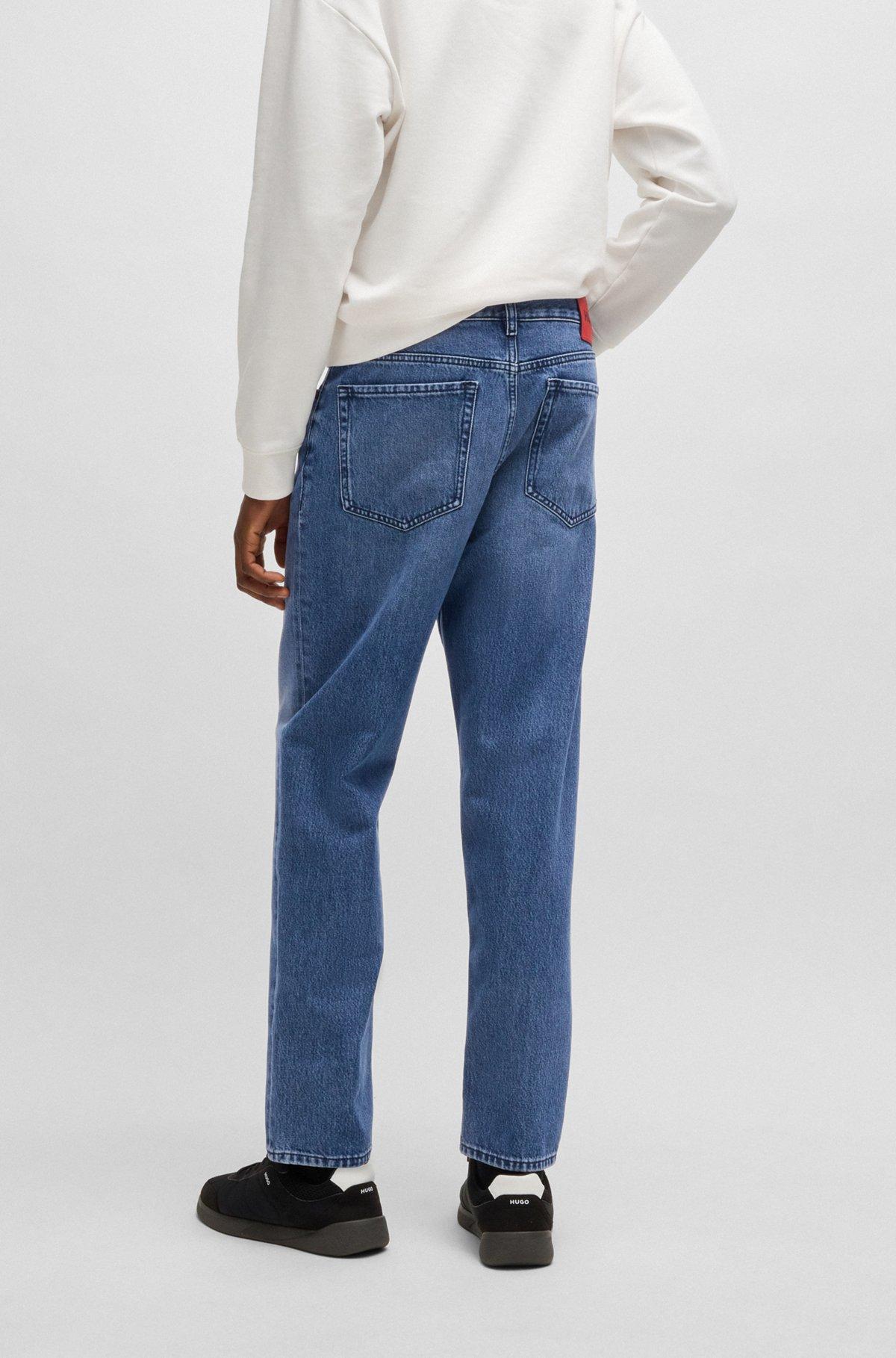 Relaxed tapered-fit jeans in blue vintage-wash denim Product Image