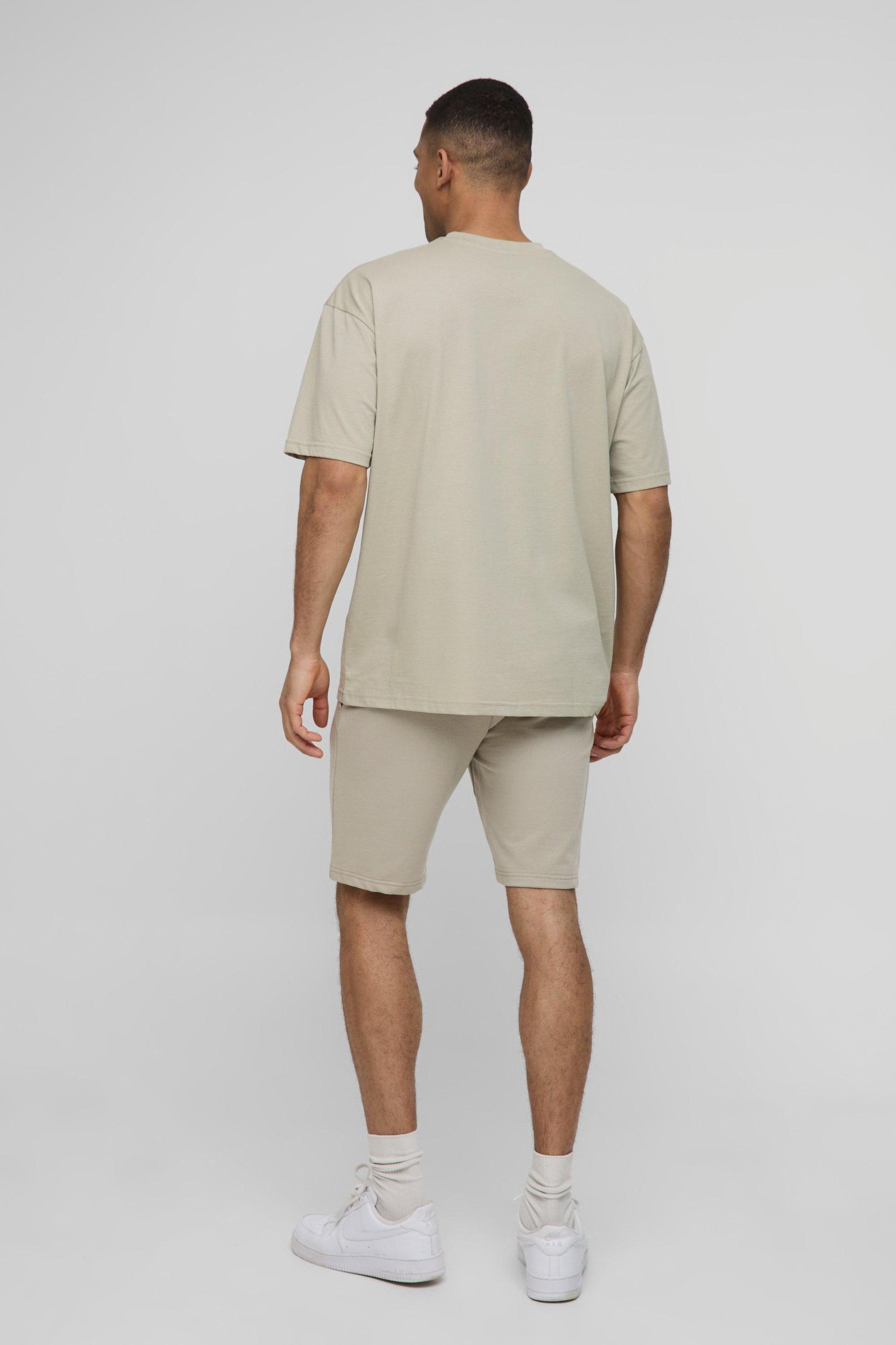 260GSM Loopback Basic MAN. Slim Fit Mid Length Shorts | boohooMAN USA Product Image