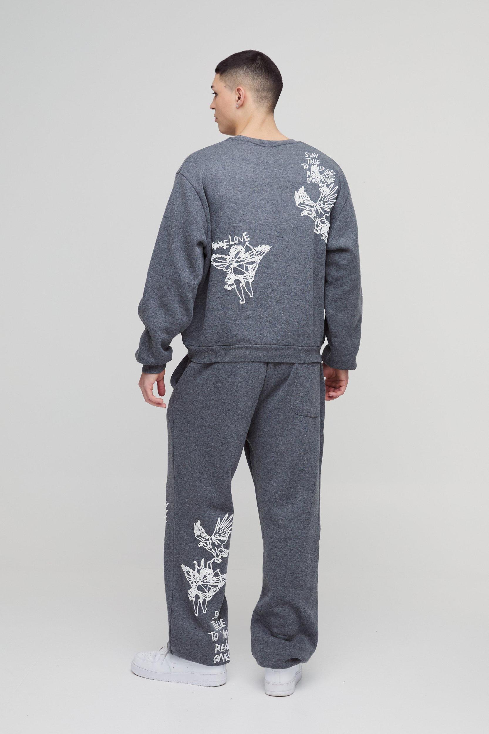 Oversized Graffiti Slogan Cuffed Sweatpants | boohooMAN USA Product Image