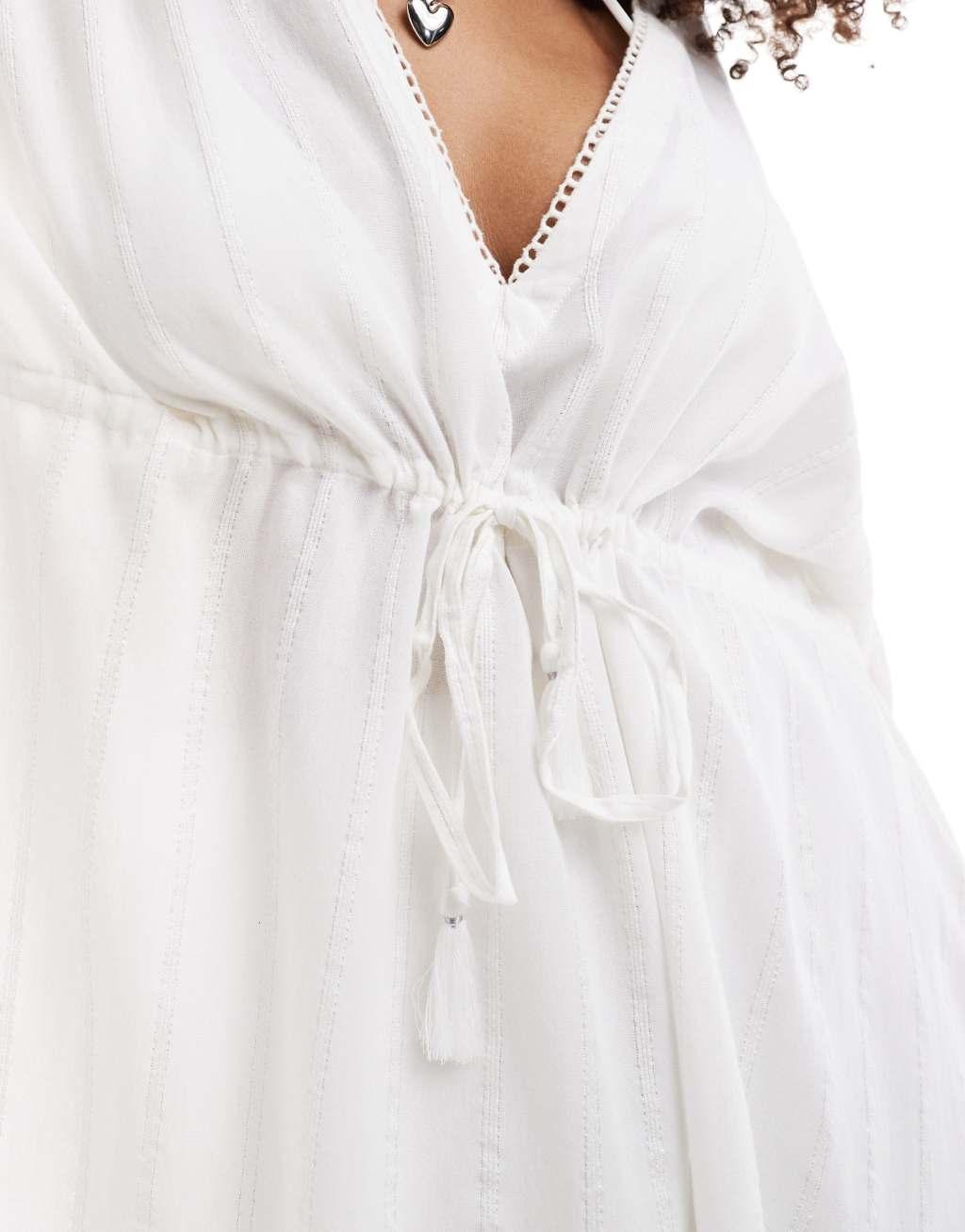 Accessorize beach cover up in white Product Image