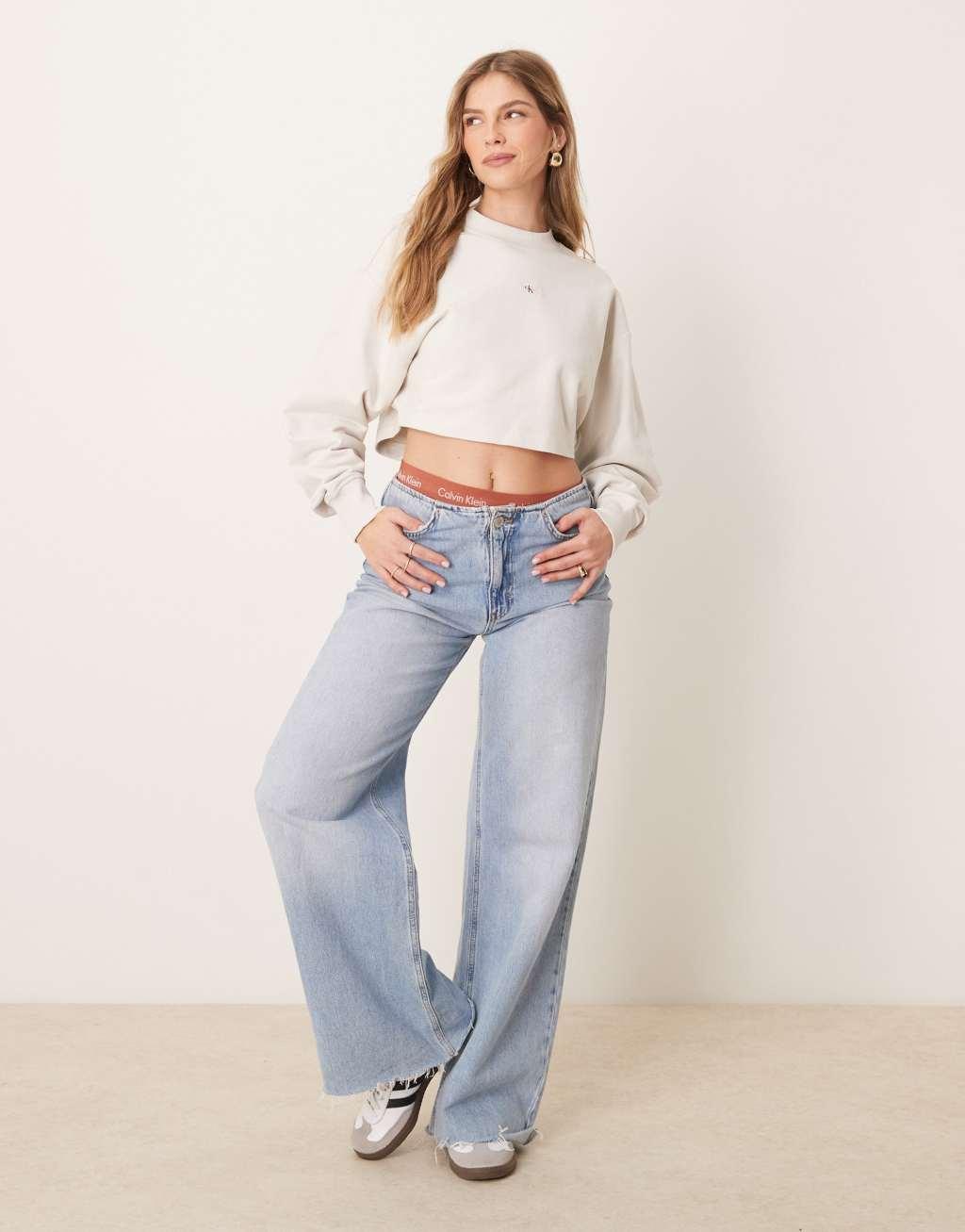 Calvin Klein Jeans woven label sweatshirt in off-white Product Image