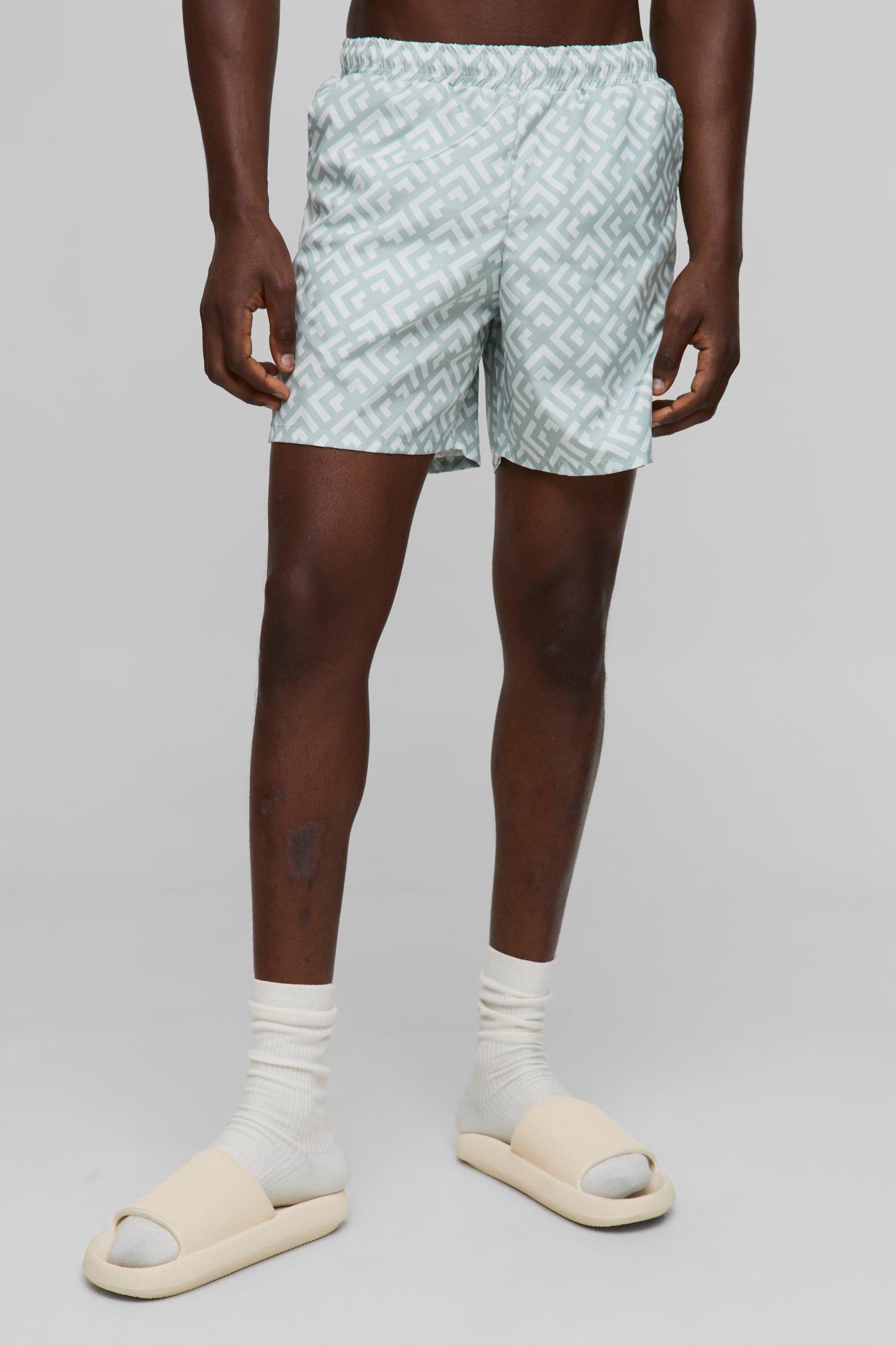 Geo Pattern Mid Length Swim Short | boohooMAN USA Product Image