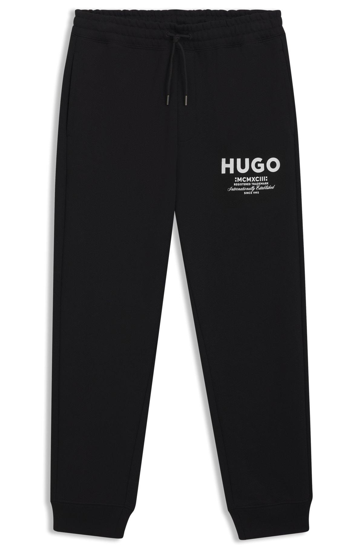 Cotton-terry tracksuit bottoms with logo print Product Image