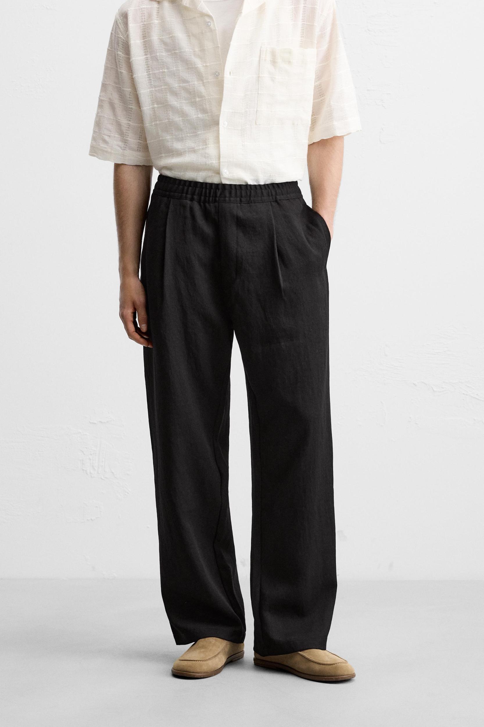 FLOWY PLEATED PANTS Product Image
