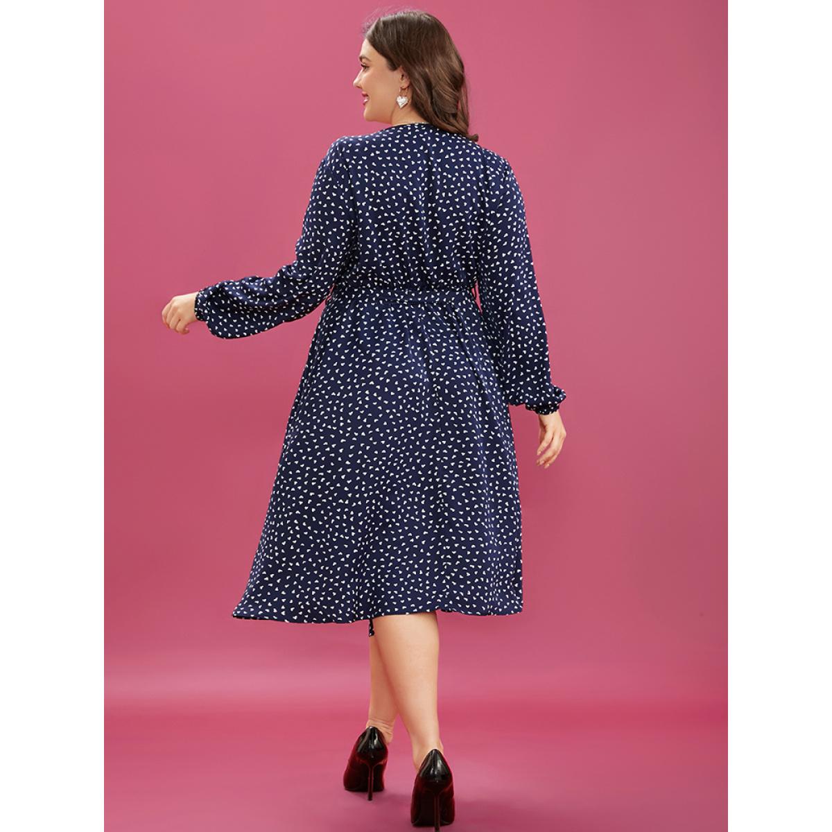 Plus Size Heart Print Surplice Neck Pocket Asymmetrical Belted Flutter Dress Navy Women Elegant Pocket V-neck Long Sleeve Curvy Midi Dress BloomChic 10/M Product Image