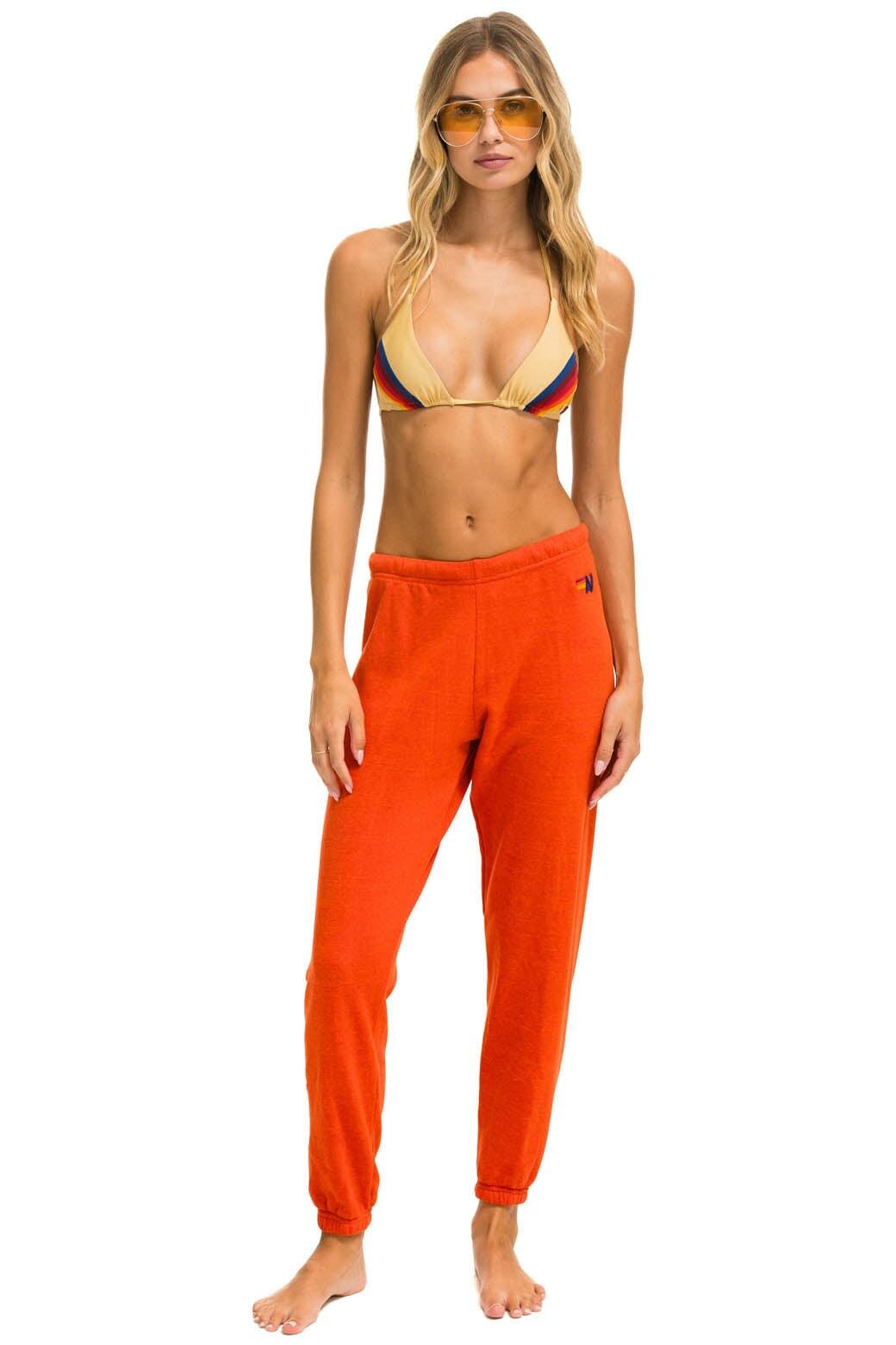 RIDE LOGO WHITE SWEATPANTS - ORANGE Female Product Image