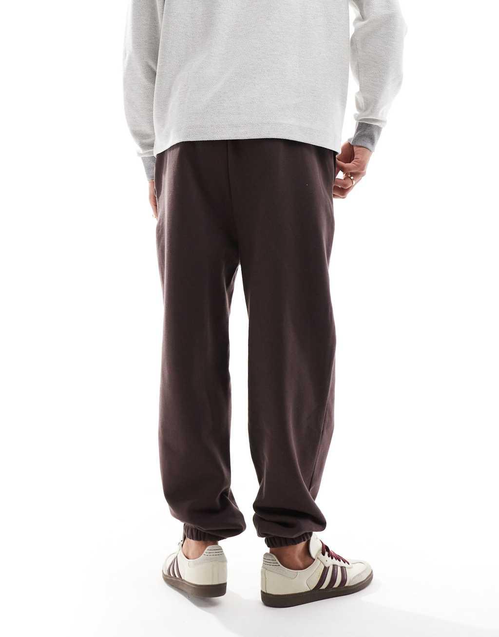 ASOS DESIGN premium heavyweight oversized sweatpants 400gsm in brown Product Image
