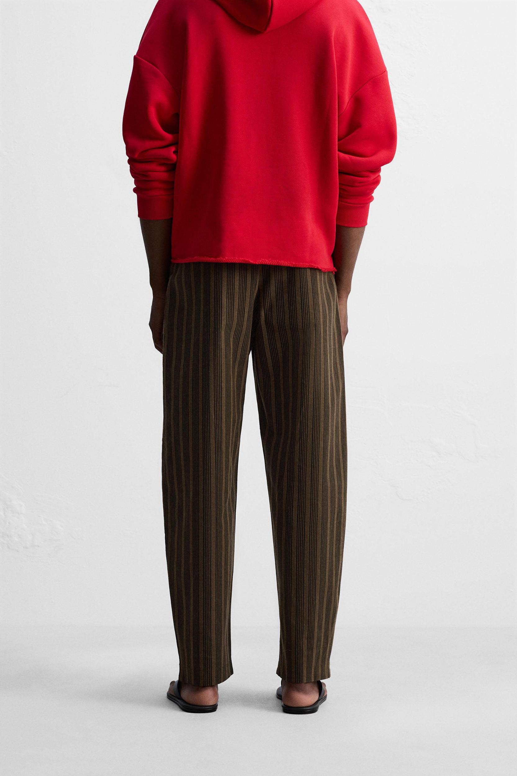 STRIPED BALLOON FIT PANTS © OTIS KWAME KYE QUAICOE Product Image