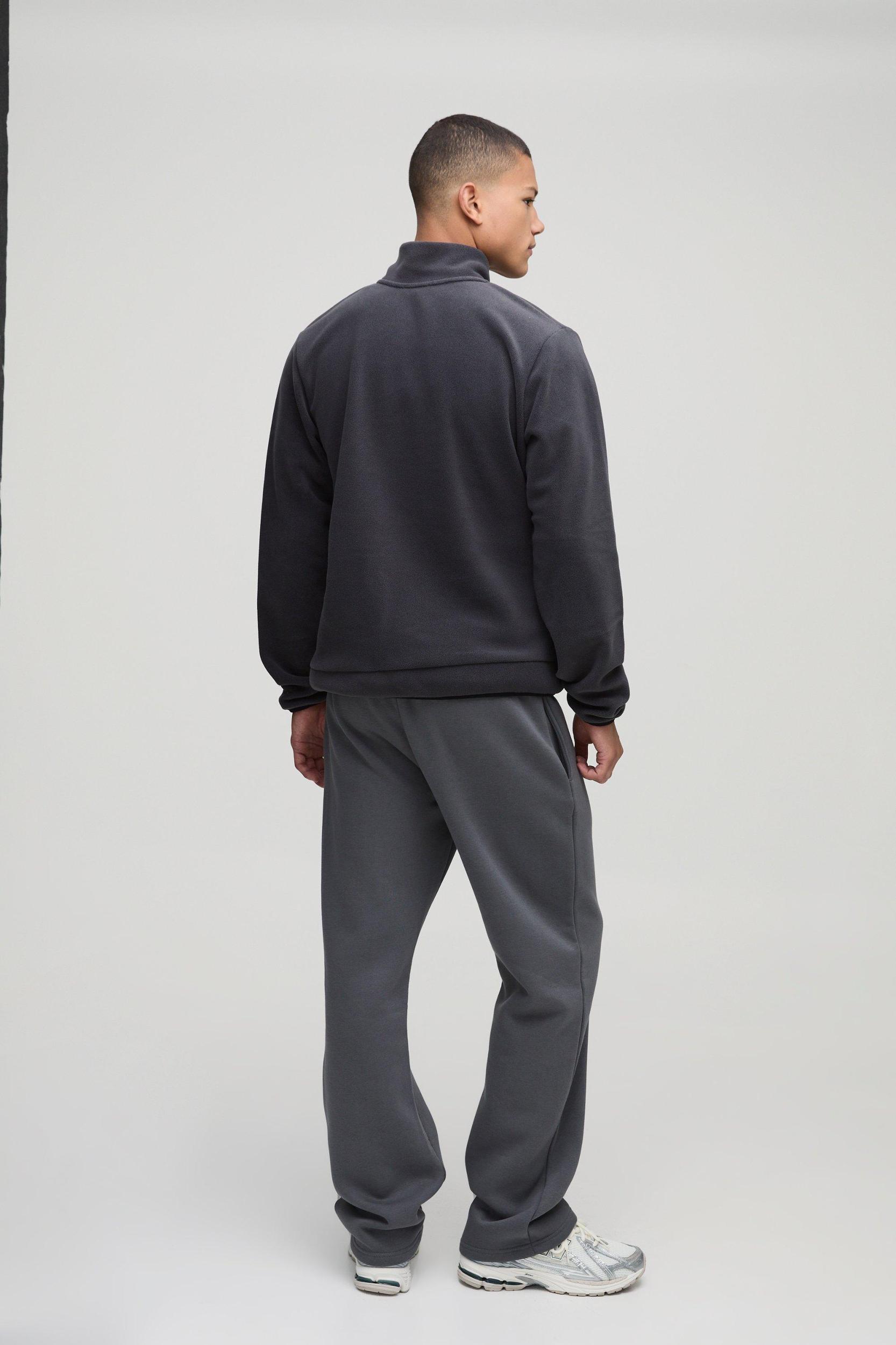 Regular Fit Embroidered Polar Fleece Zip Through Track Jacket | boohooMAN USA Product Image