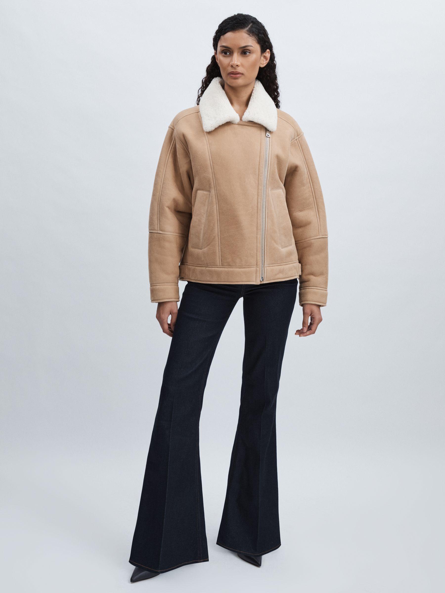 Paige Angled-Waist Flared Jeans in Kira Blue Product Image