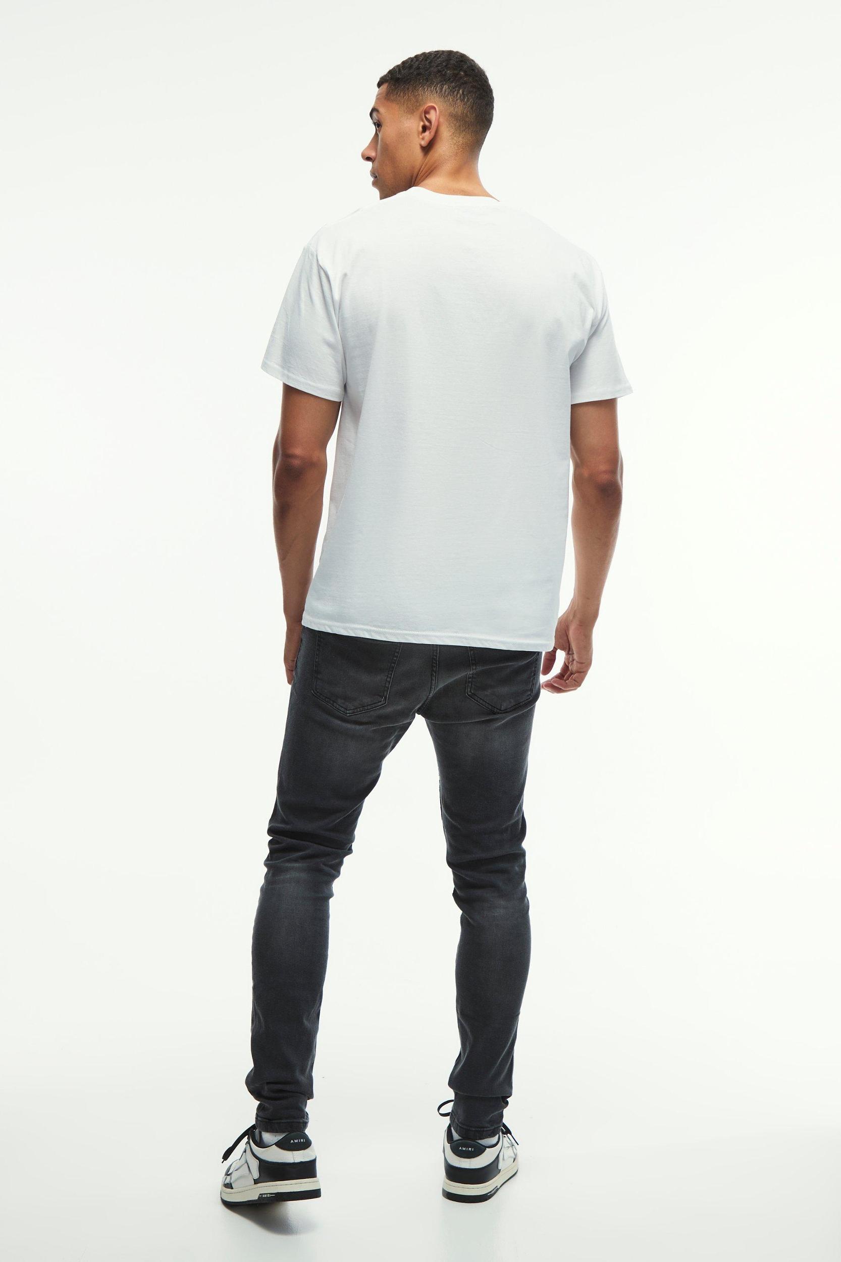 Skinny Stretch Knee Rip Paint Splatter Jeans | boohooMAN USA Product Image