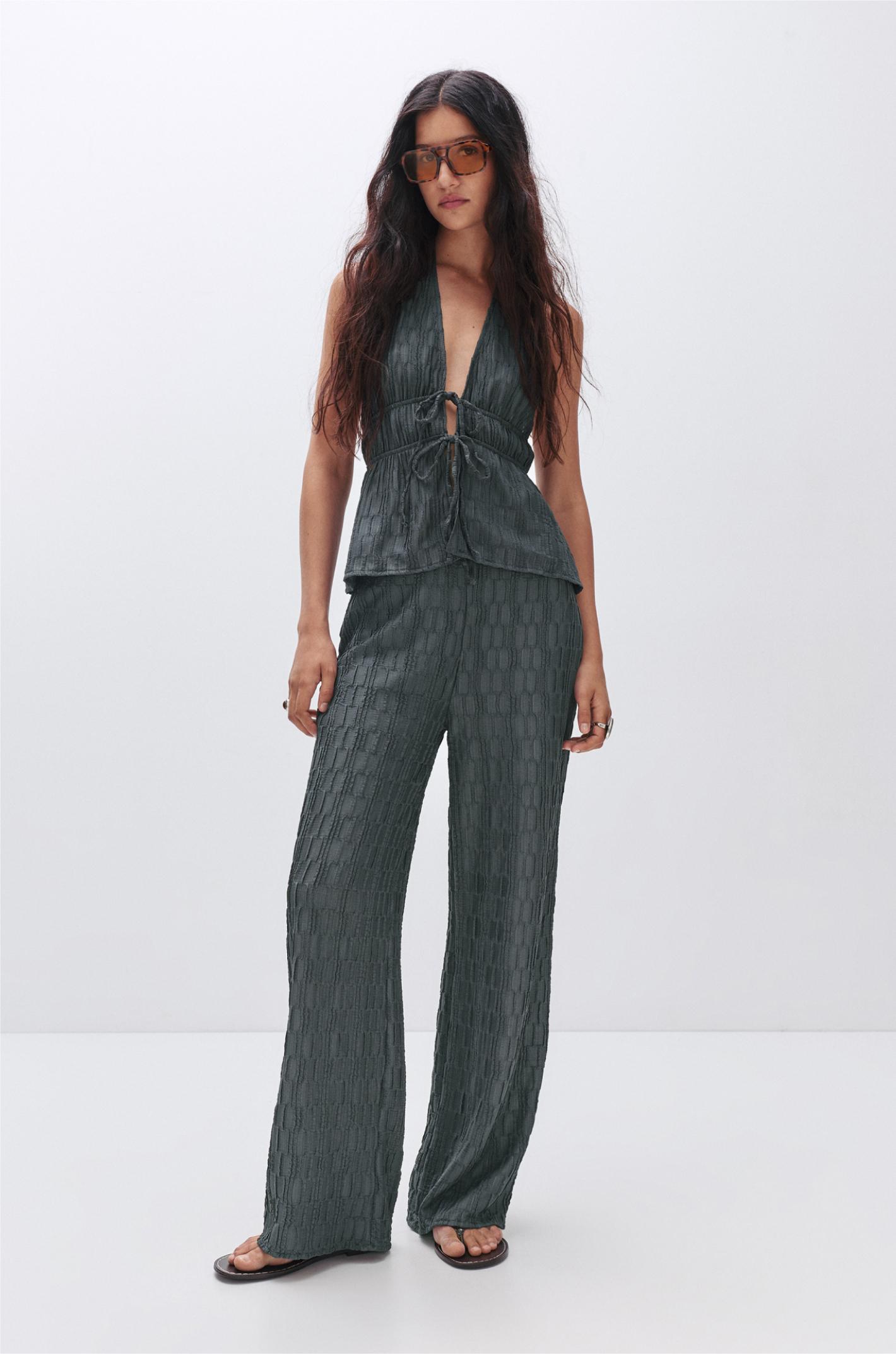 Textured bell bottom trousers Product Image
