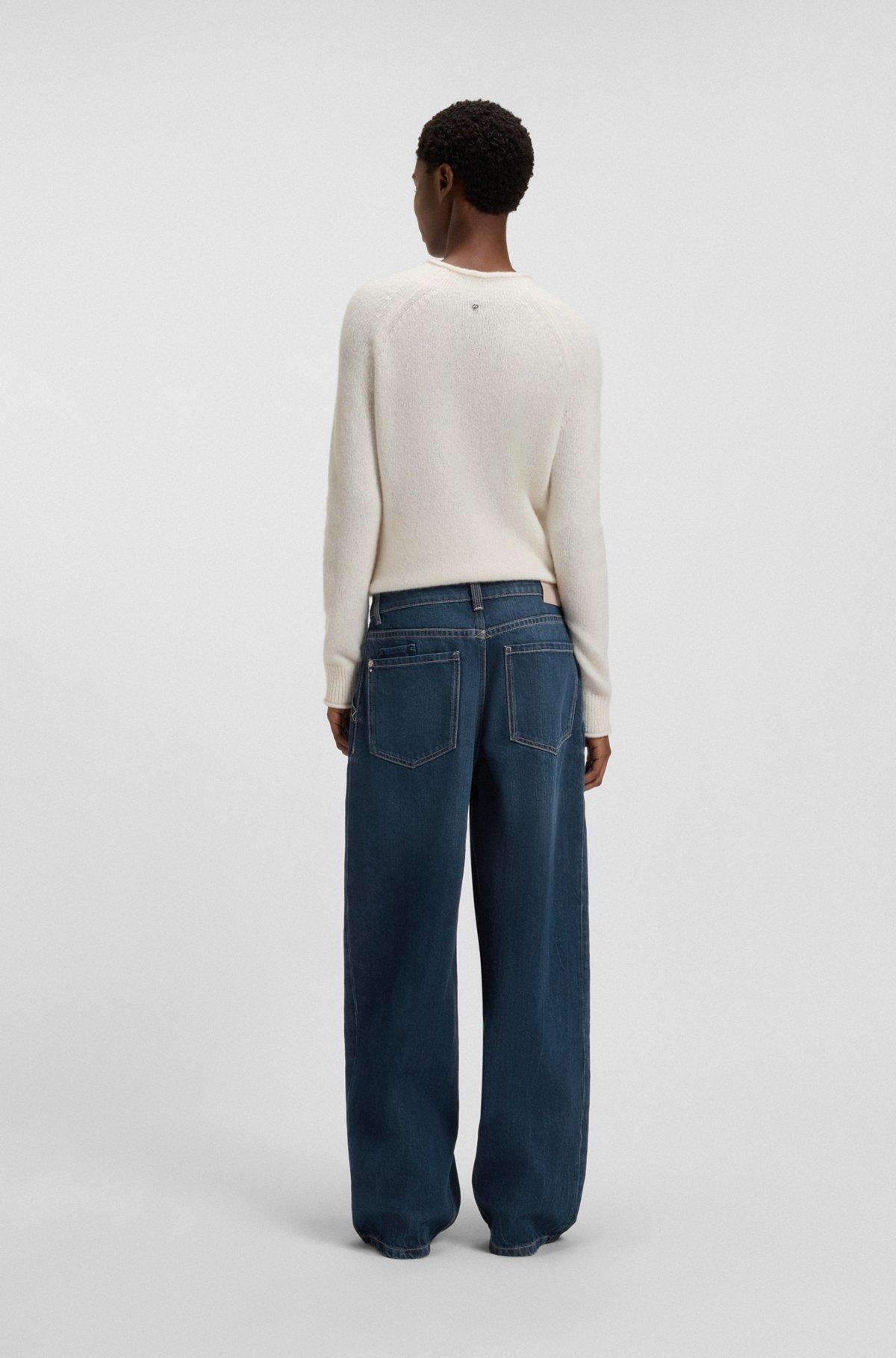Wide-leg jeans with front pleats Product Image