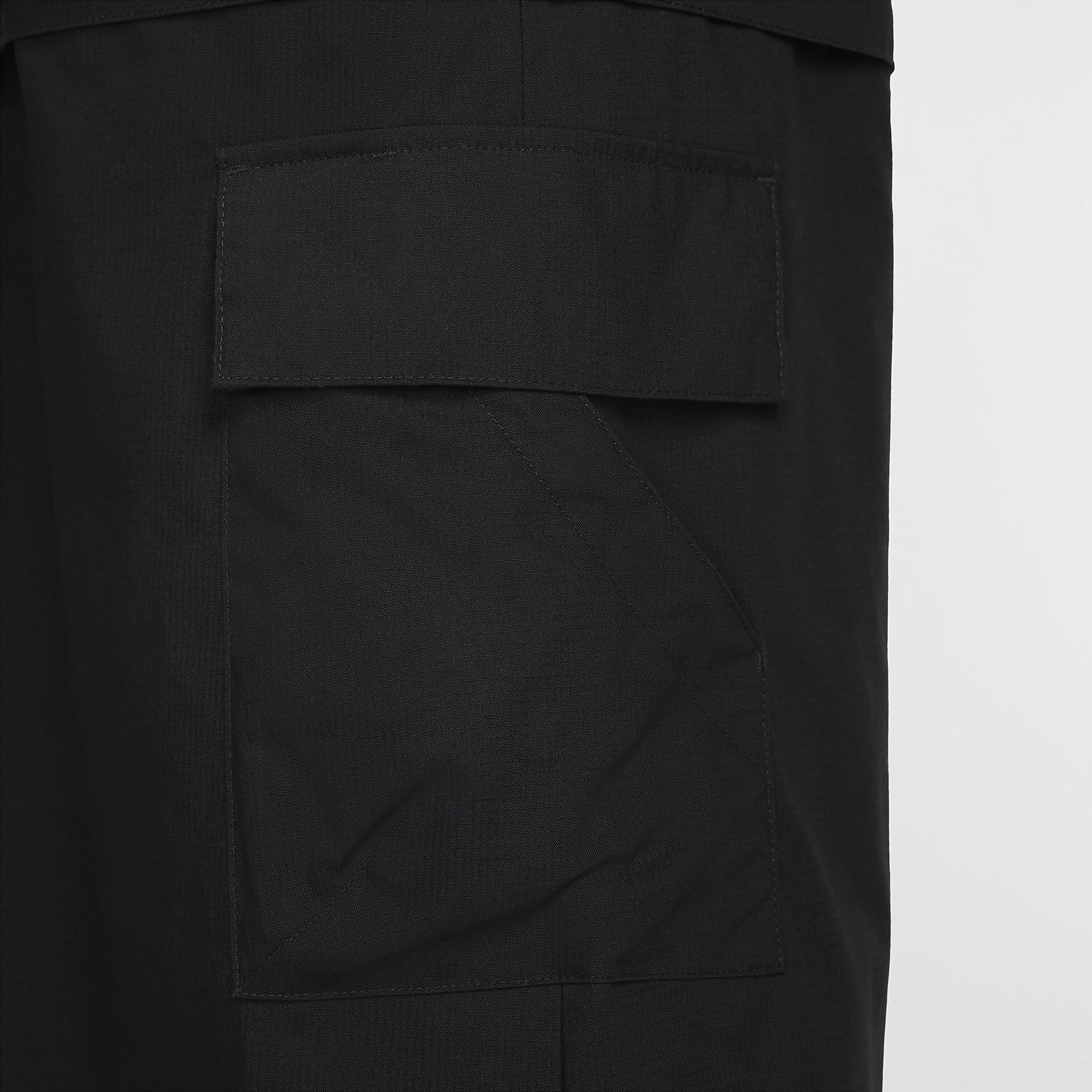 Nike Sportswear Essential Women's Mid-Rise Woven Cargo Midi Skirt Product Image