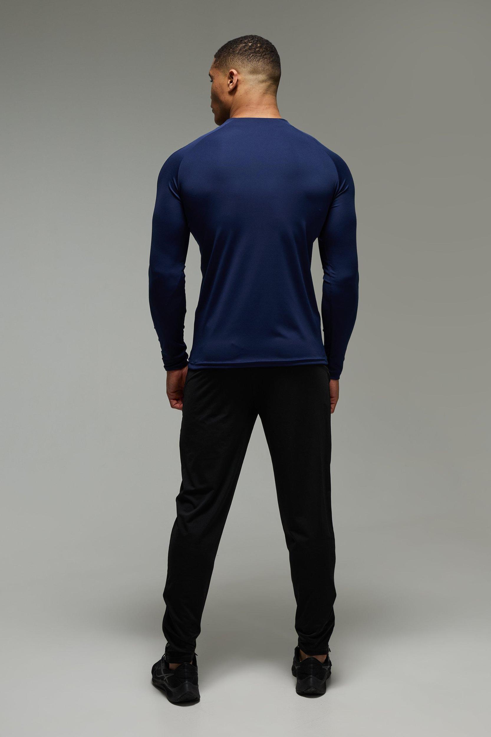 Man Active Muscle Fit Crew Neck 1/4 Zip | boohooMAN USA Product Image