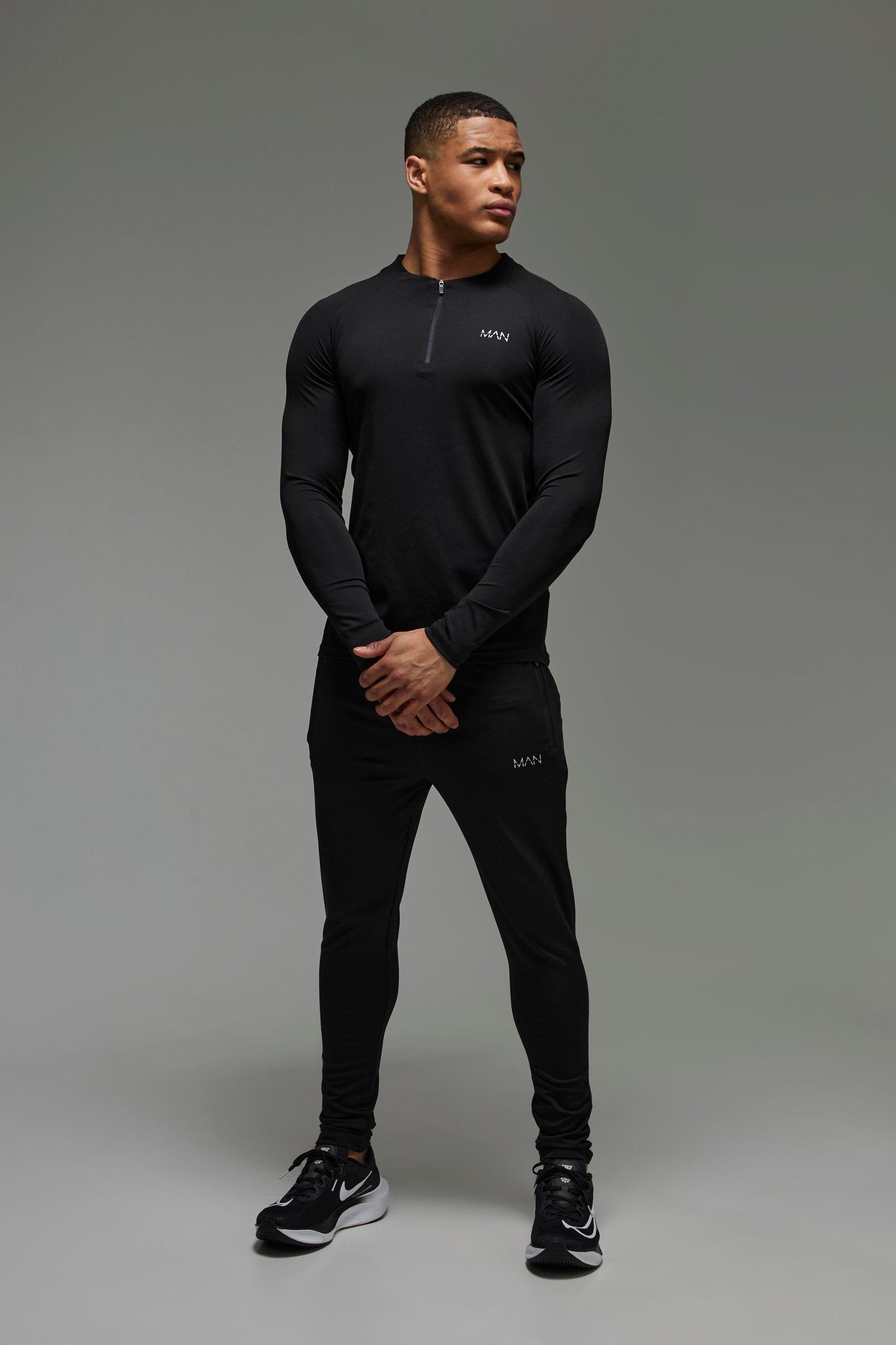 Man Active Muscle Fit Crew Neck 1/4 Zip Tracksuit | boohooMAN USA Product Image