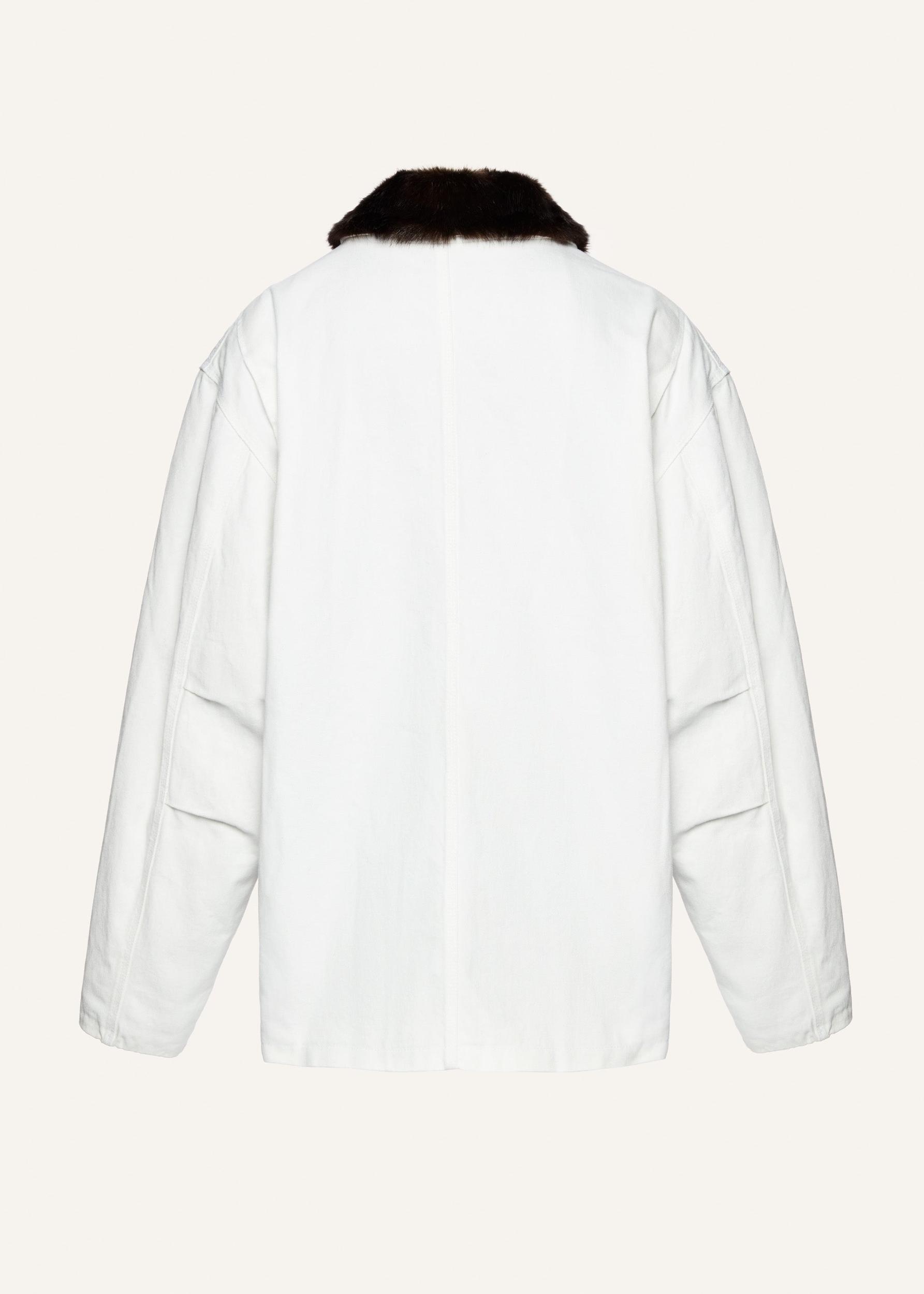 Oversized denim jacket with faux fur collar in white Product Image