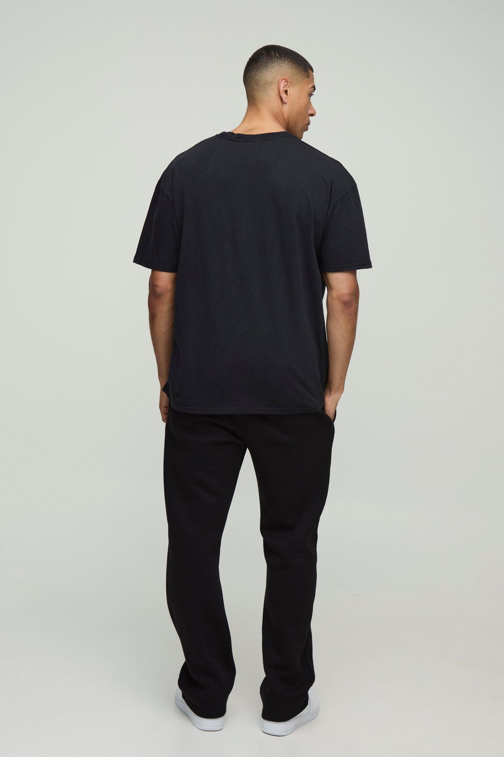 Black Oversized Puff Print Planet Washed Graphic T Shirt | boohooMAN USA Product Image