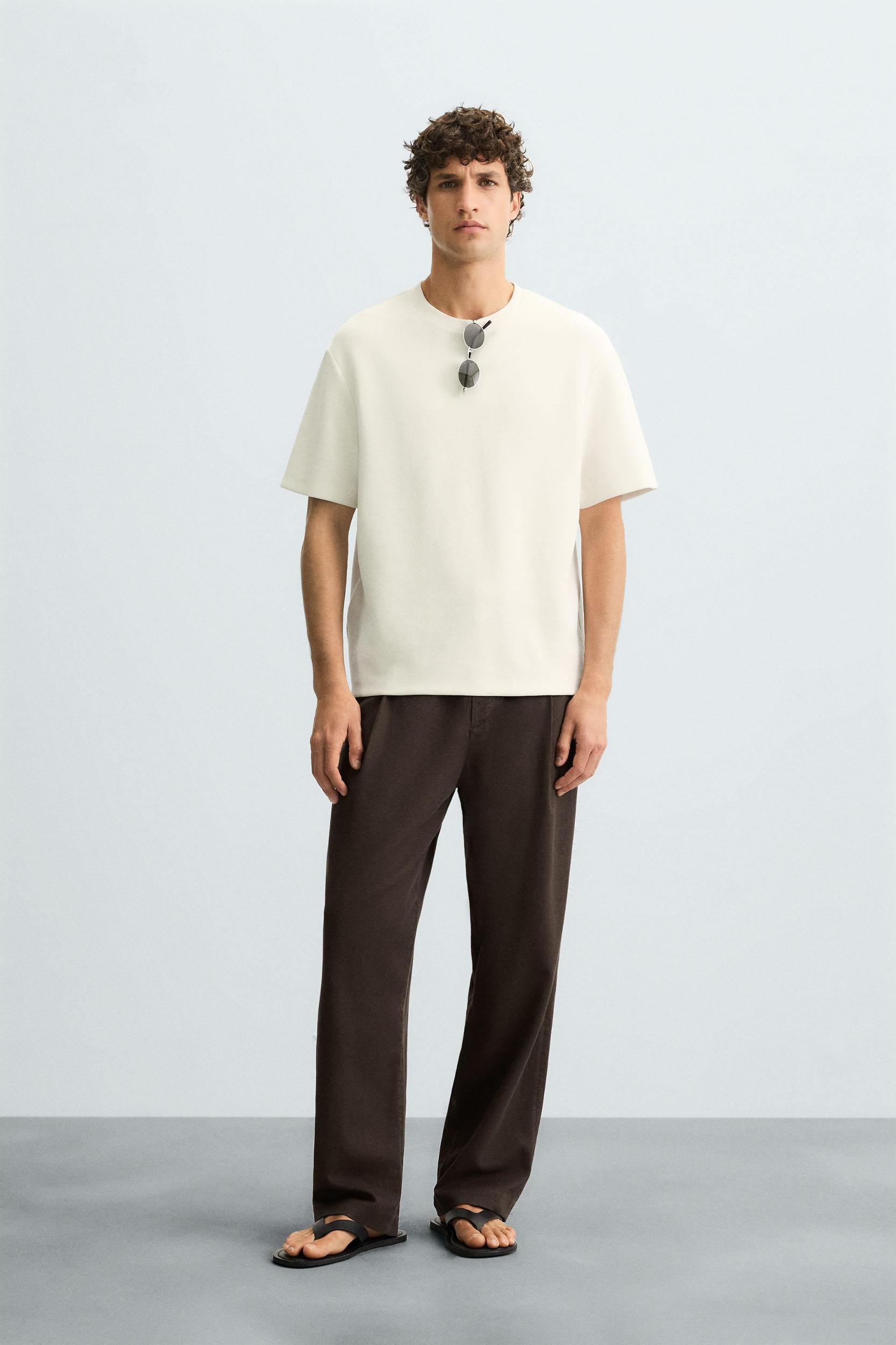 FLOWY PLEATED PANTS Product Image