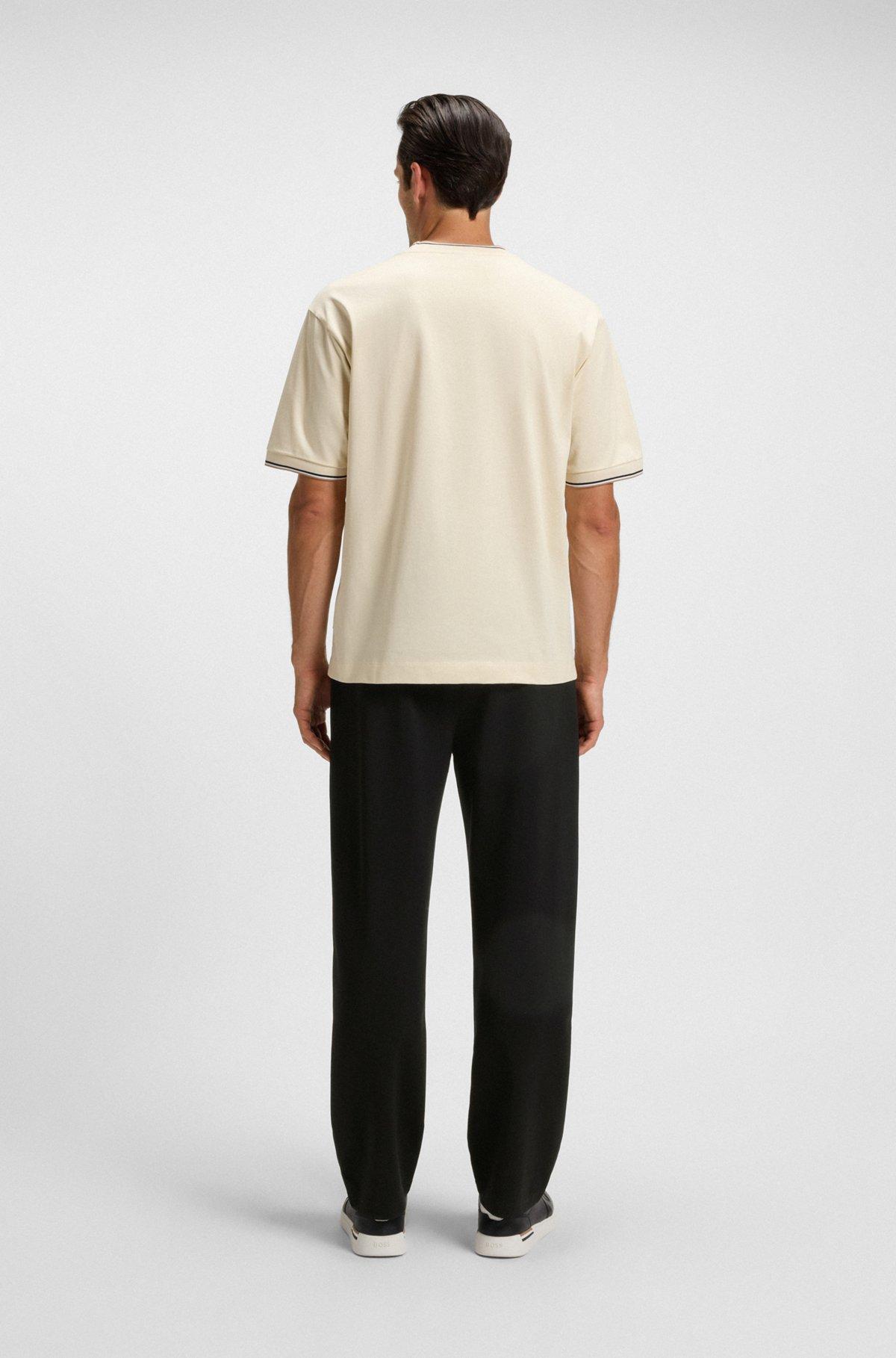 Tracksuit bottoms with patterned drawcord Product Image