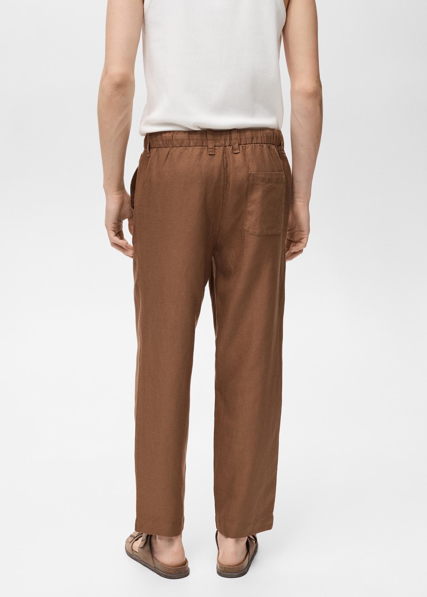 Linen-blend pants with an elastic waistband - Men | MANGO USA Product Image