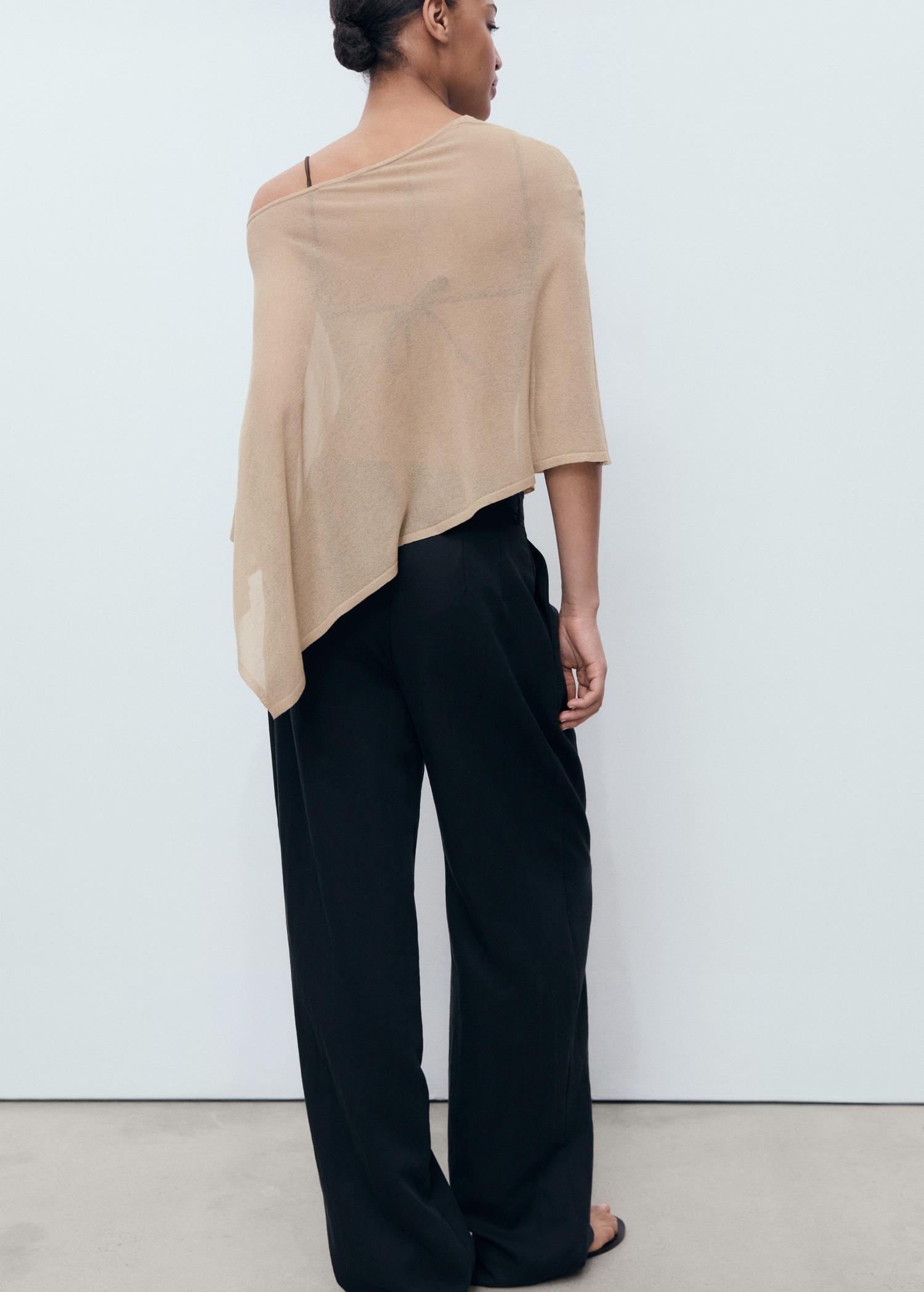 Asymmetrical knitted cape - Women | MANGO USA Product Image