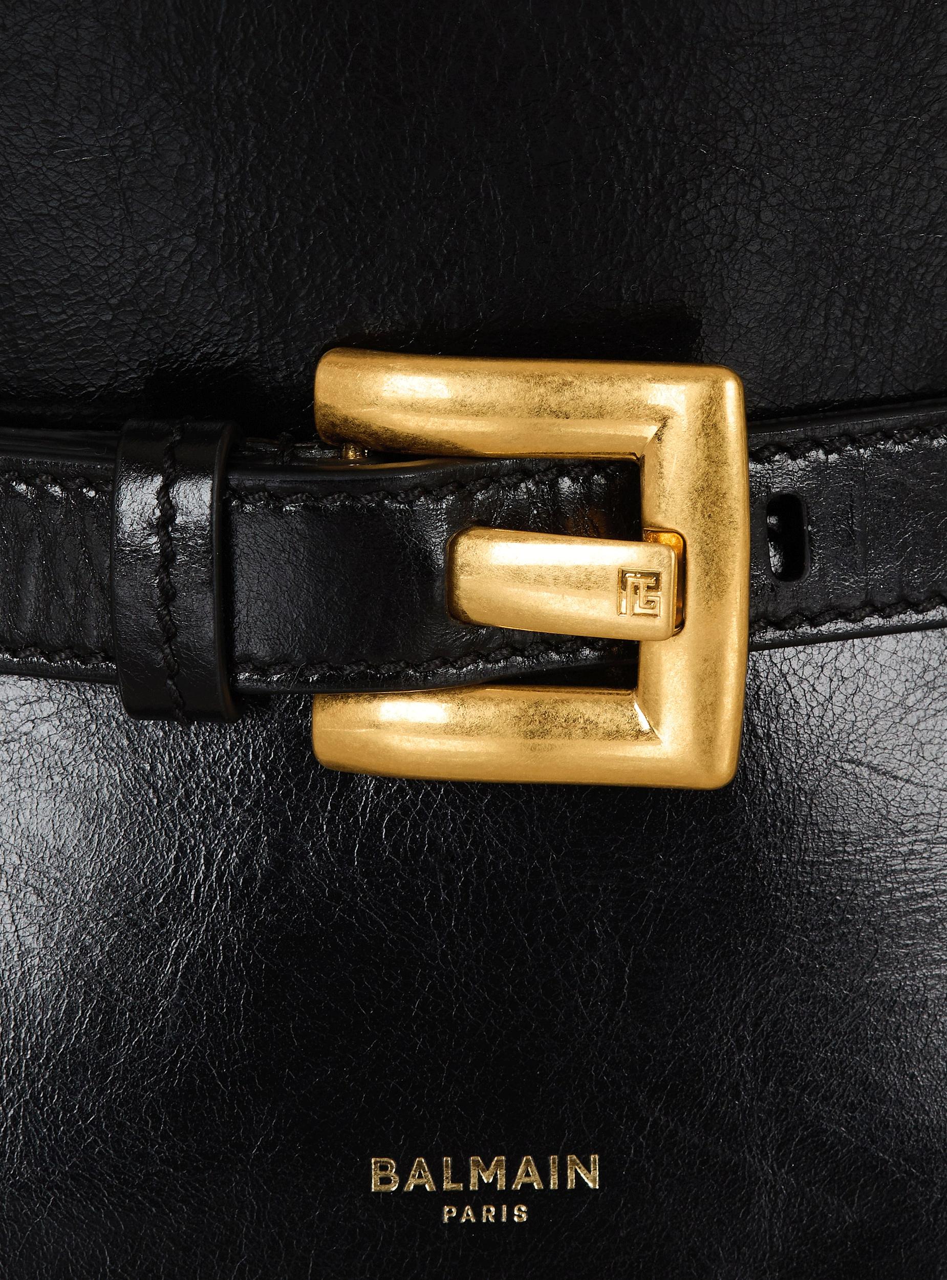 Shuffle Mini bag in leather Product Image