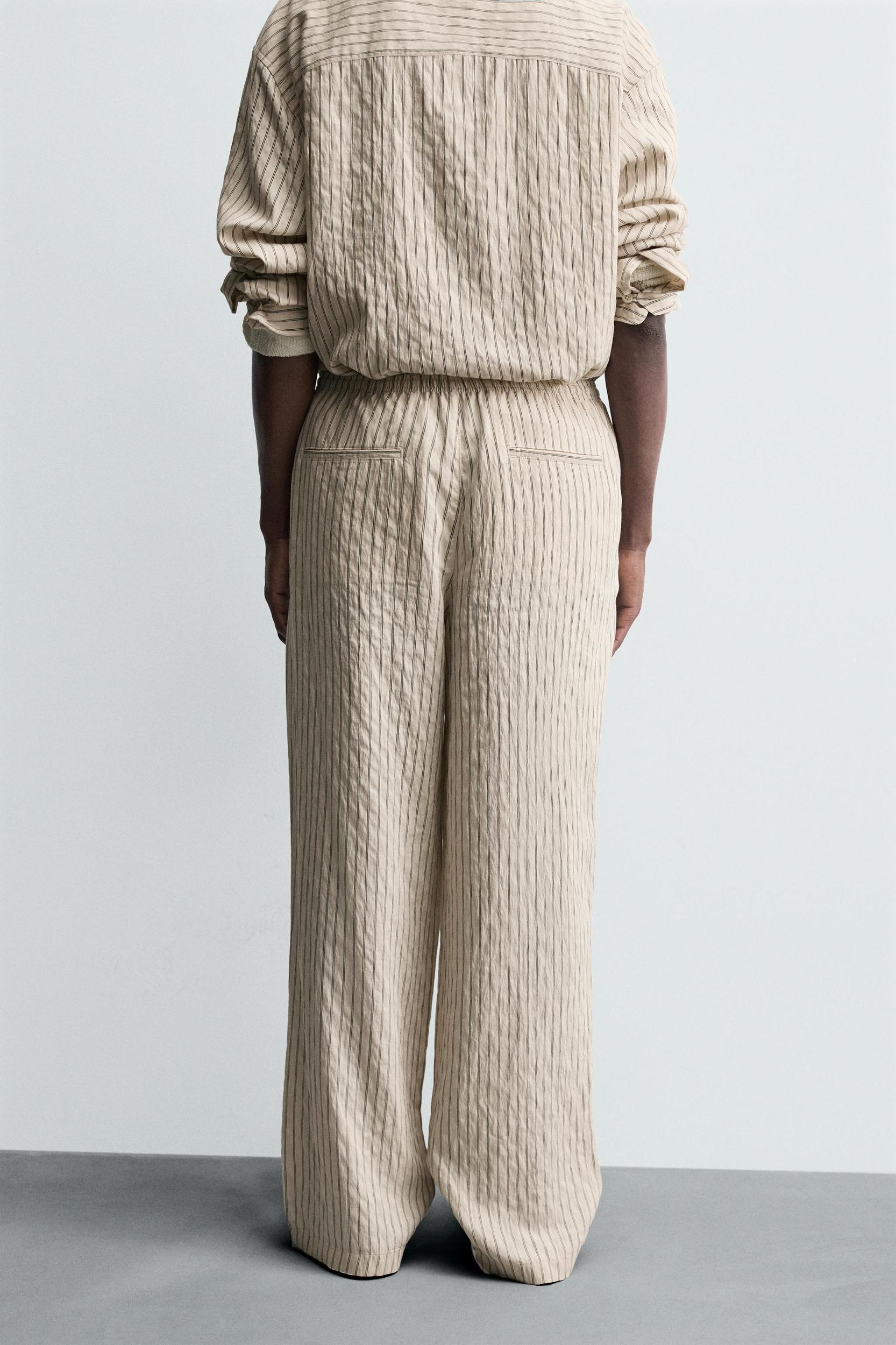 WRINKLED EFFECT STRIPED FLOWY PANTS Product Image