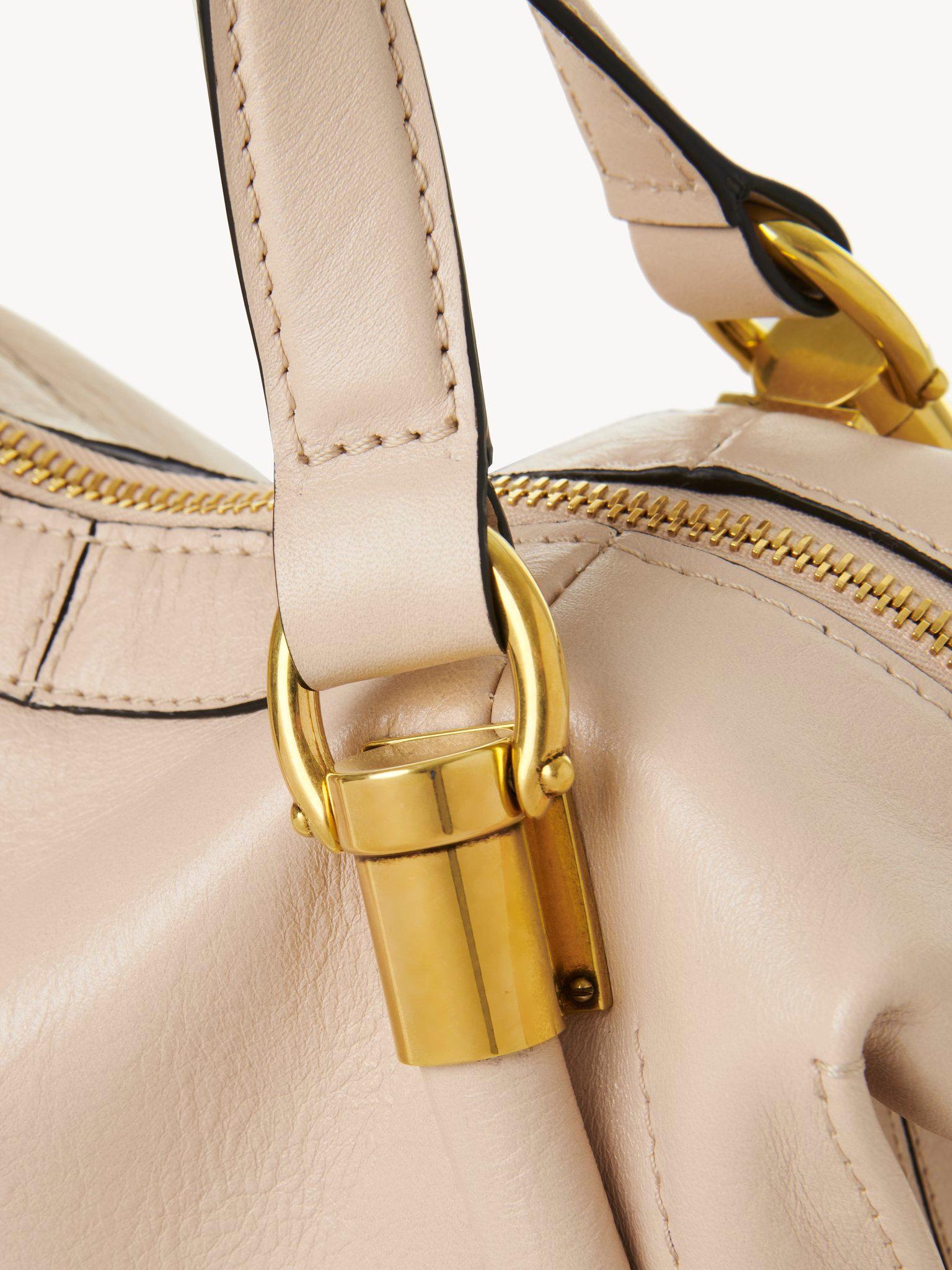 Small Paraty 24 bag in shiny leather Product Image