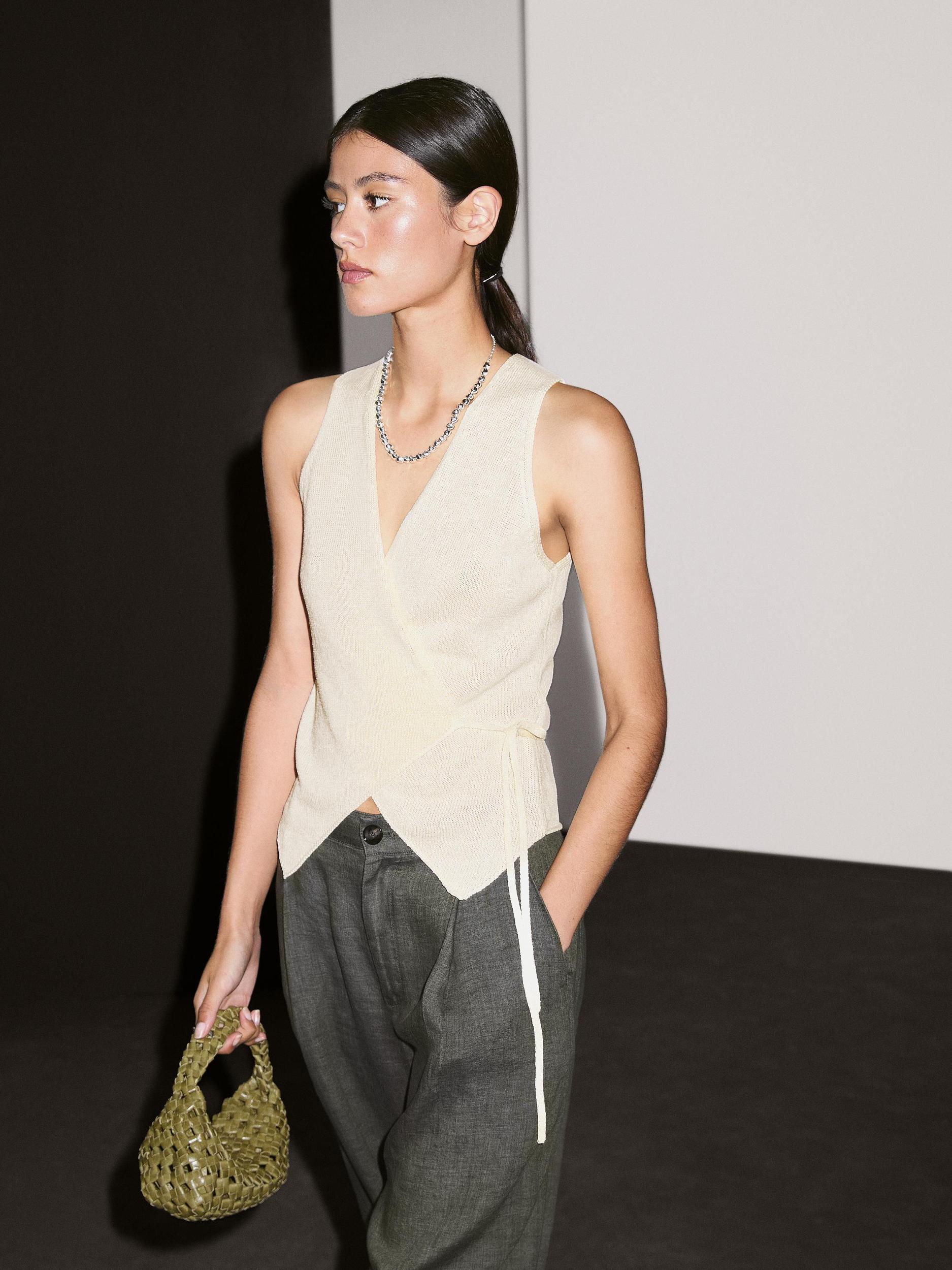 Knit crossover waistcoat with drawstring Product Image