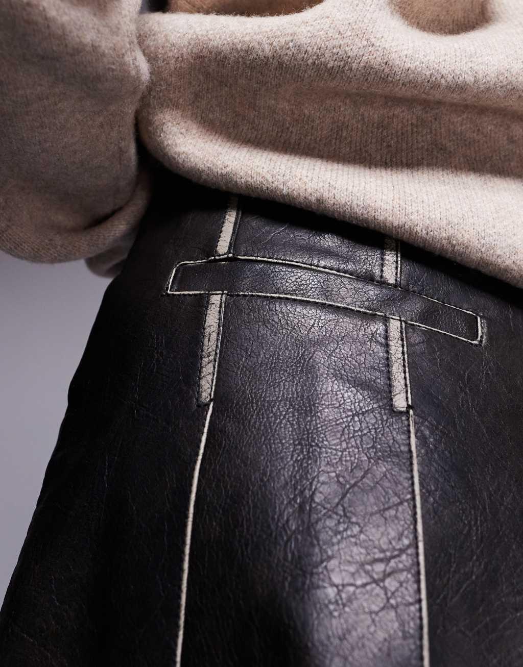 River Island faux leather pleated mini skirt in distressed black Product Image