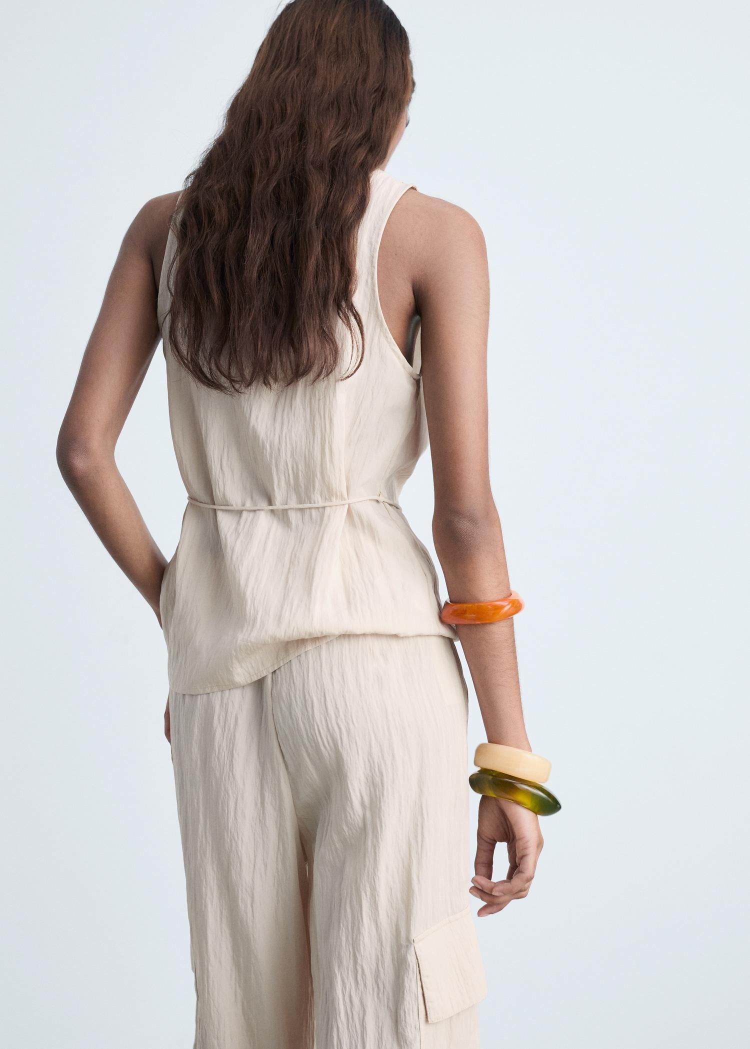 Textured bow top - Women | MANGO USA Product Image