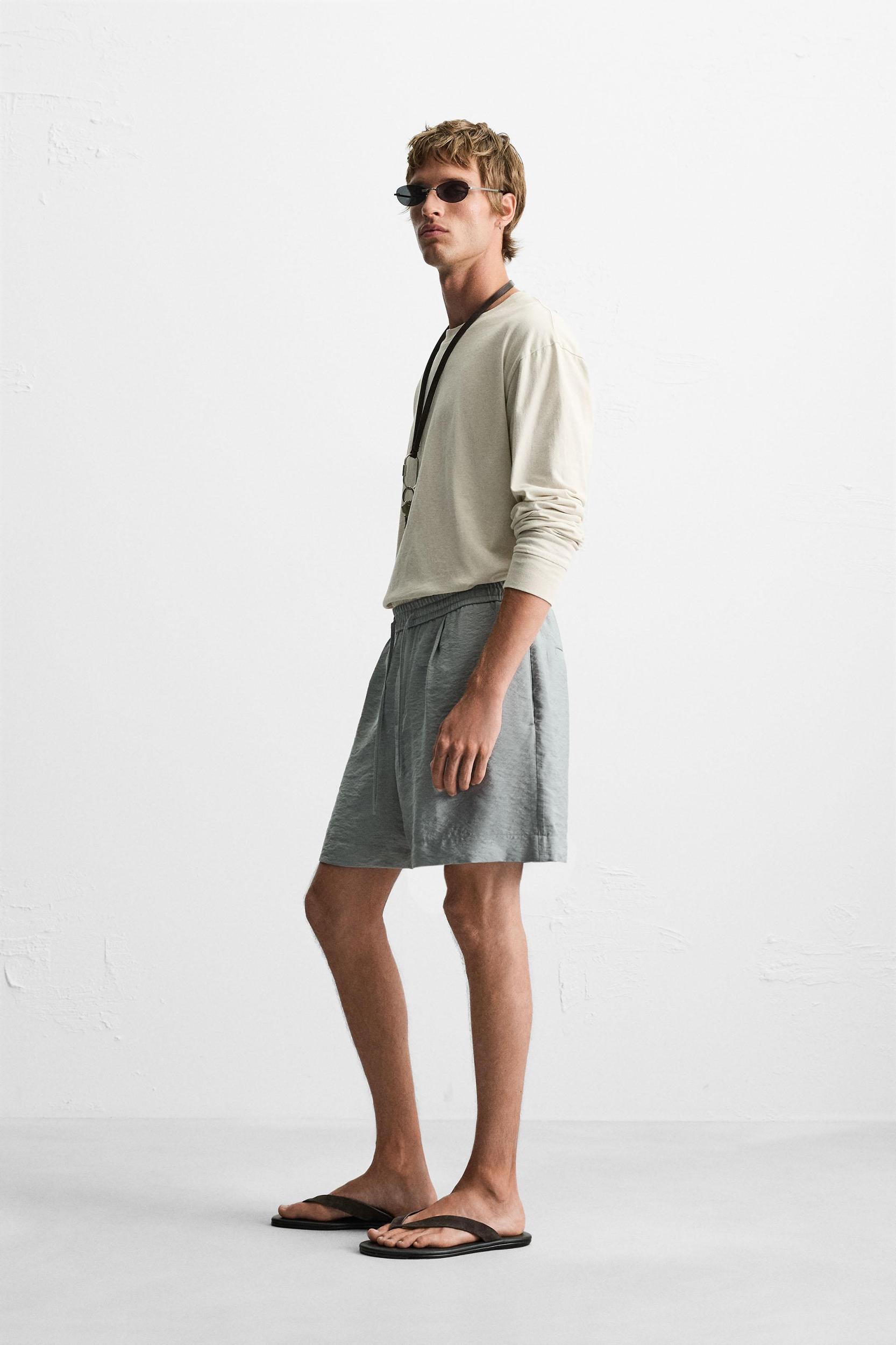 FLOWY RELAXED FIT BERMUDA SHORTS Product Image