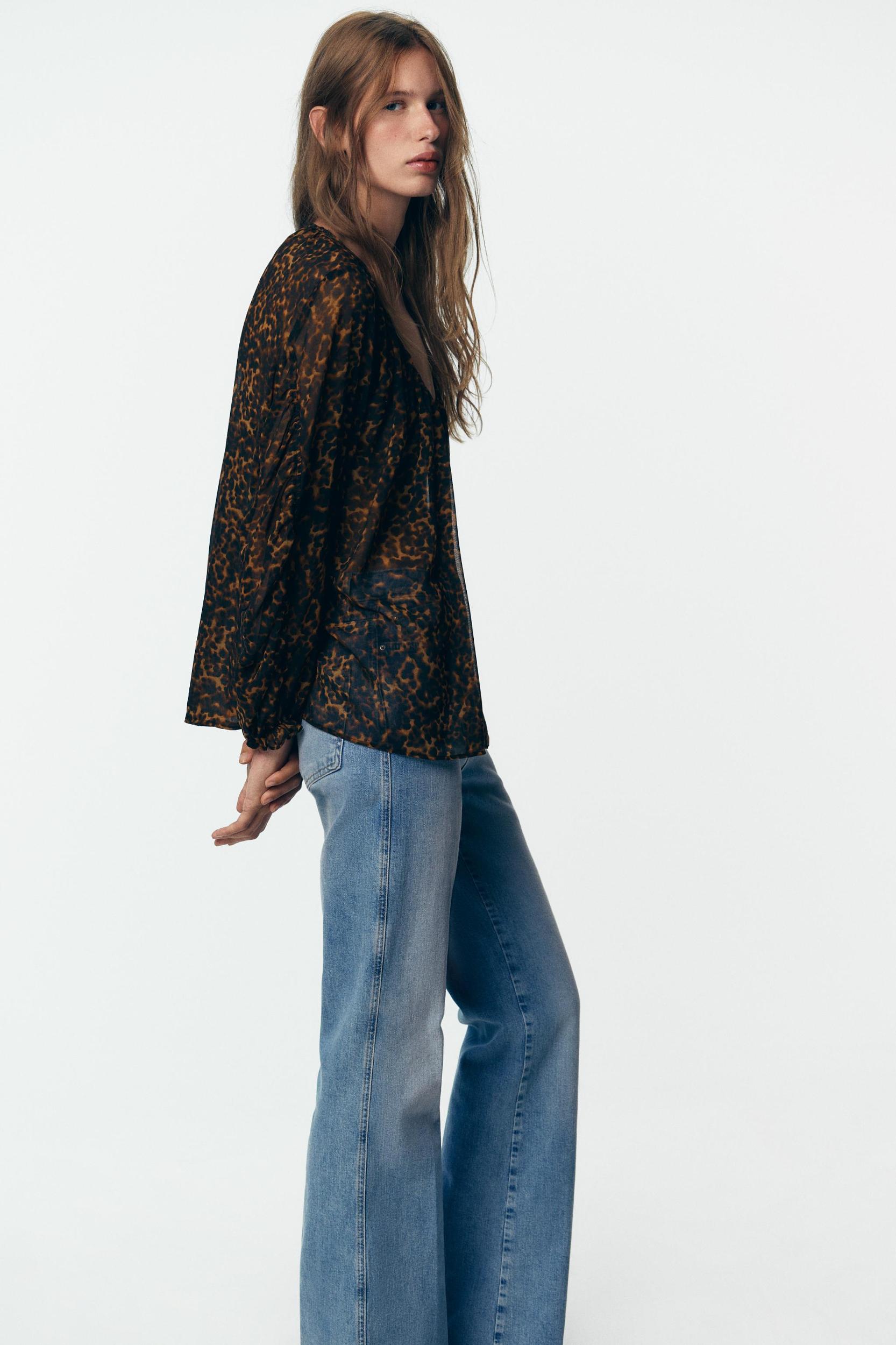 ANIMAL PRINT SEMI-SHEER BLOUSE Product Image