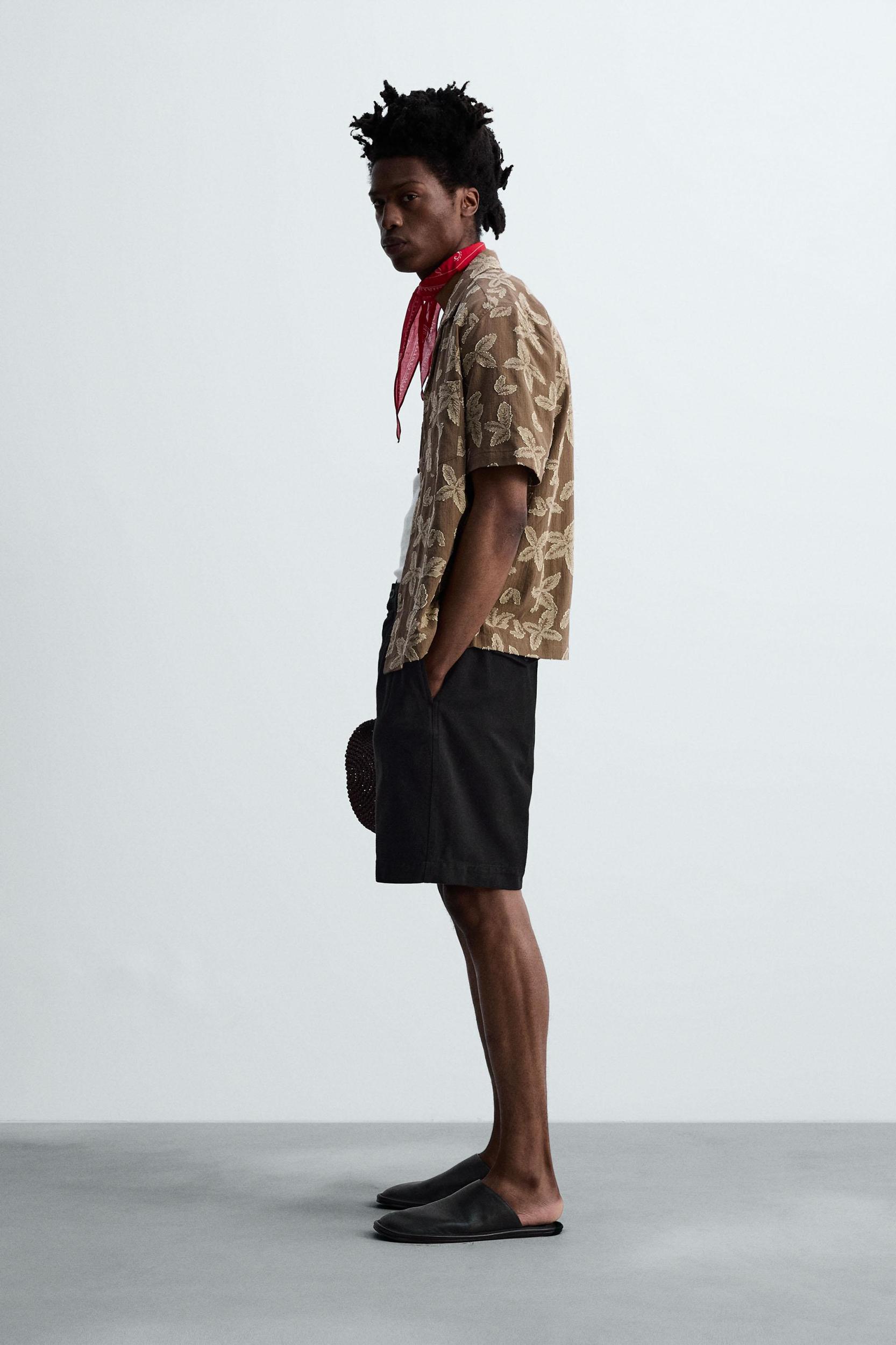 RELAXED FIT PLEATED BERMUDA SHORTS Product Image