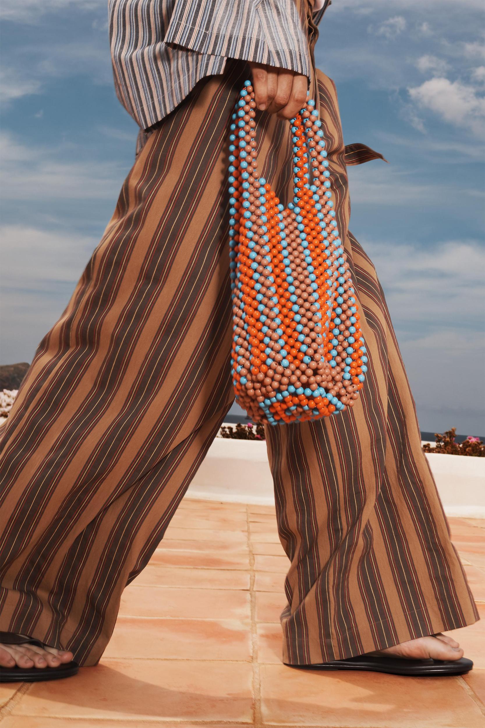 LIMITED EDITION STRIPED BELTED PANTS Product Image