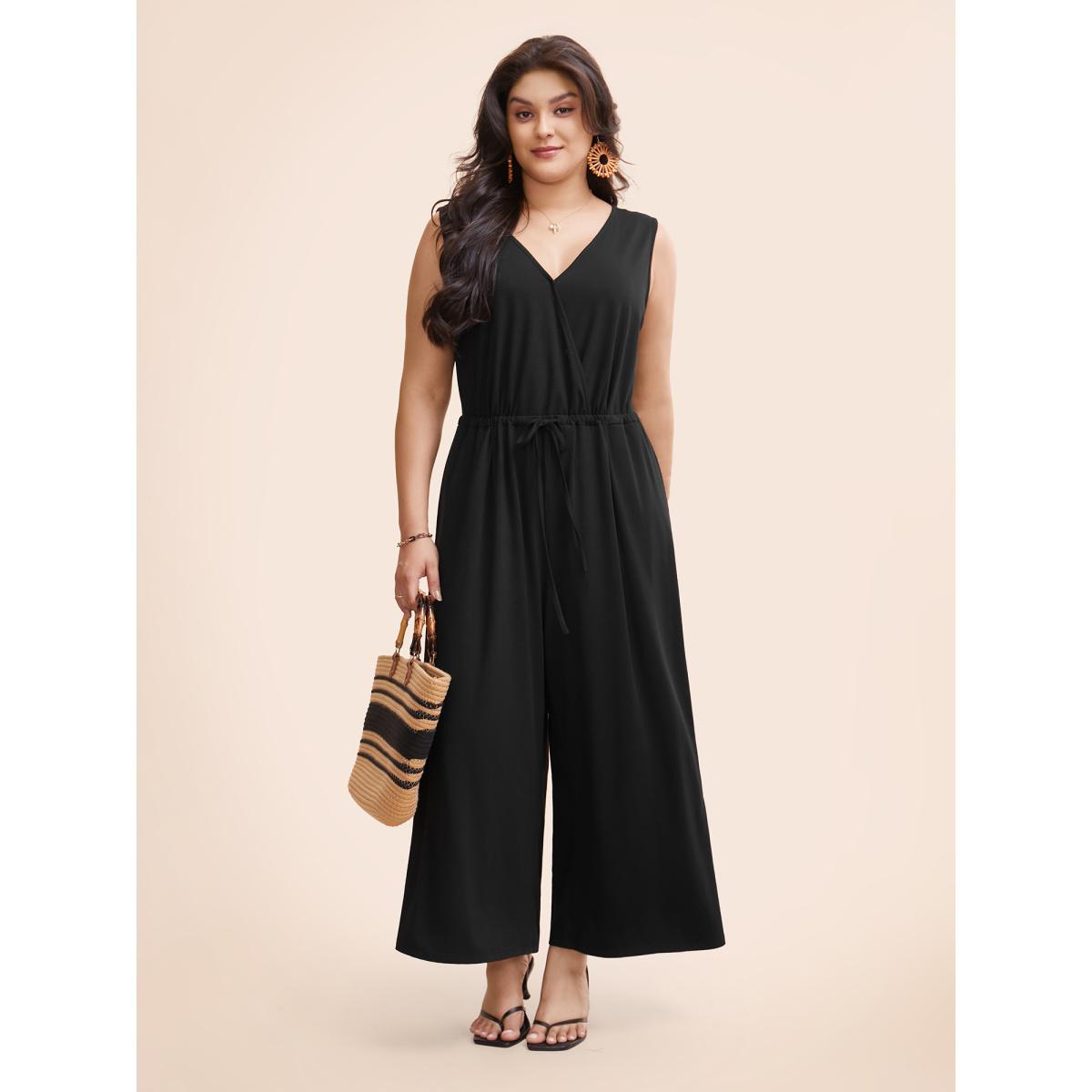 Plus Size Black Solid Overlap Collar Drawstring Jumpsuit Women Elegant Sleeveless Overlap Collar Everyday Loose Jumpsuits BloomChic 14-16/1X Product Image