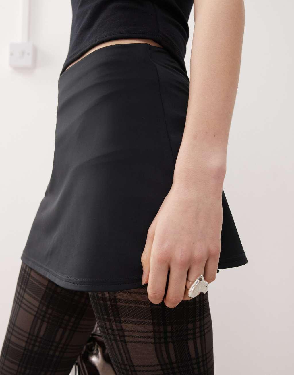 COLLUSION slinky a-line micro skort in black Product Image