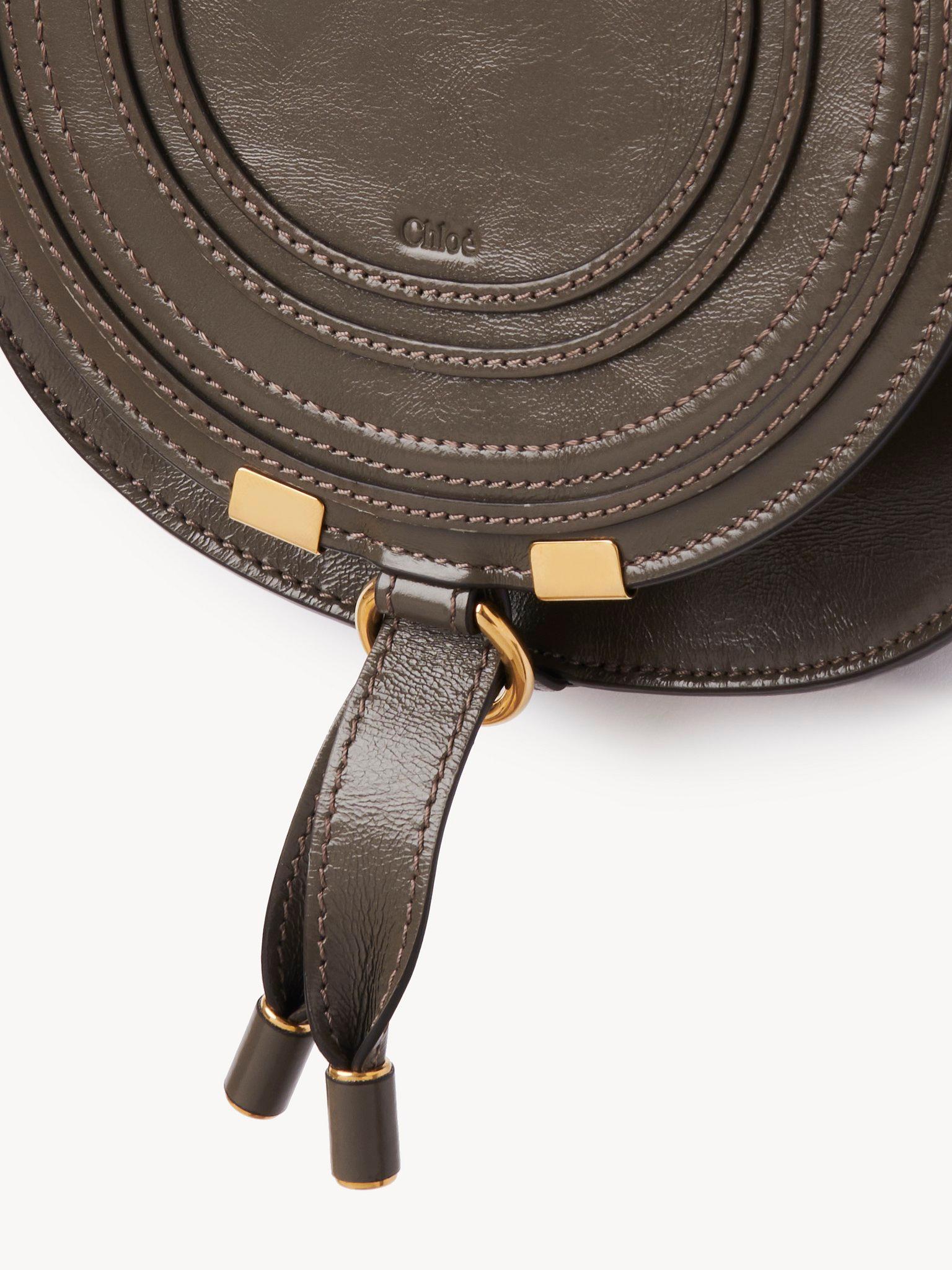 Small Marcie saddle bag in shiny leather Product Image